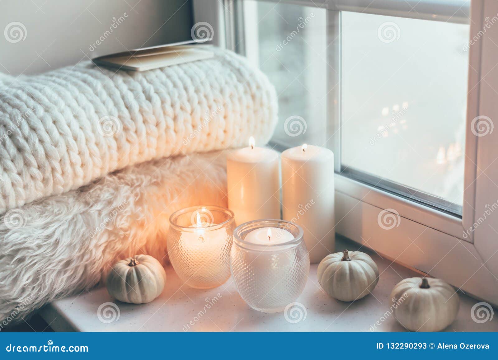 hygge scene with sweater and candles