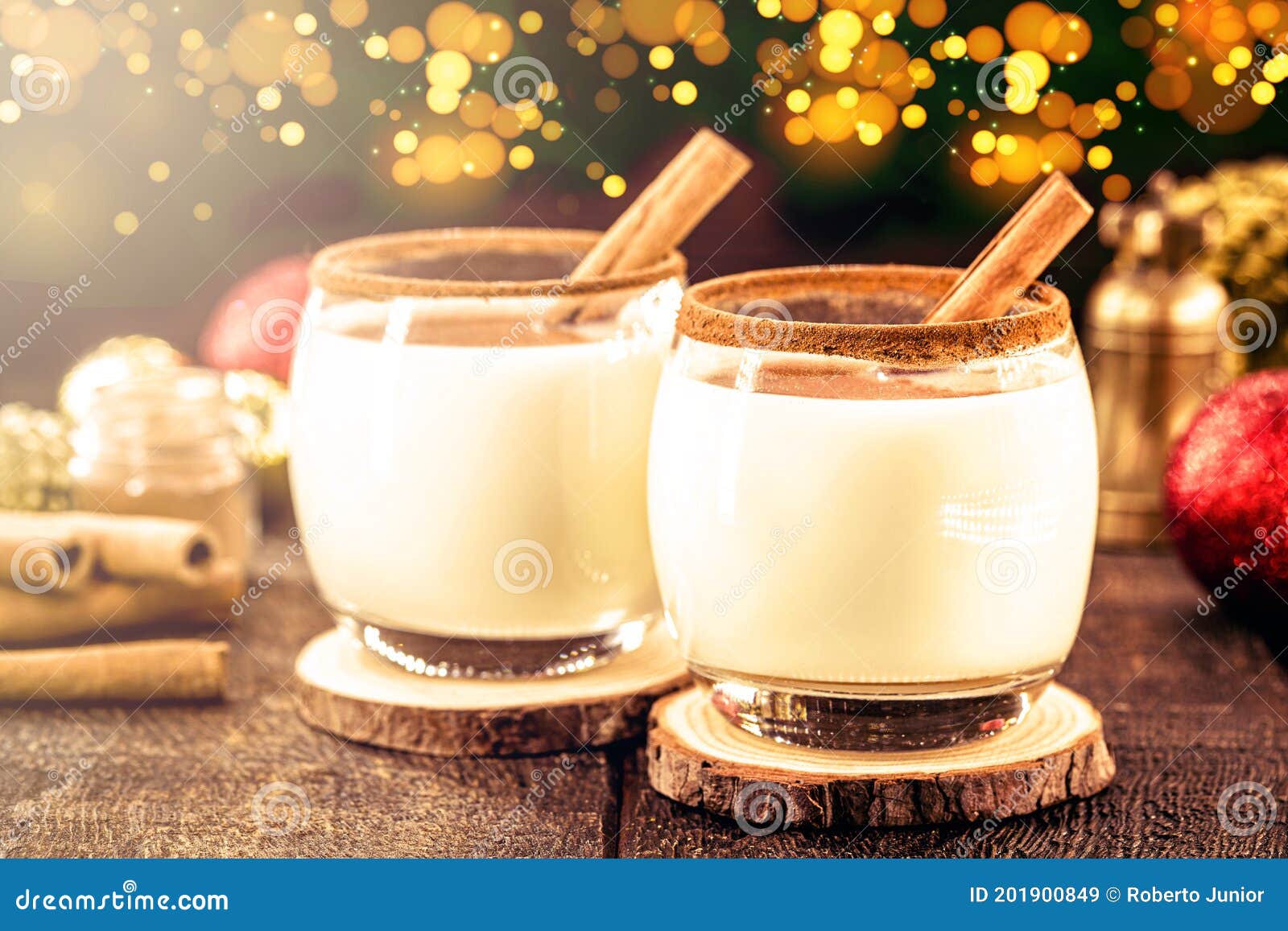 warm homemade christmas eggnog, with christmas lights, based on eggs and alcohol. called auld man milk, pisco, momo cola, coquito