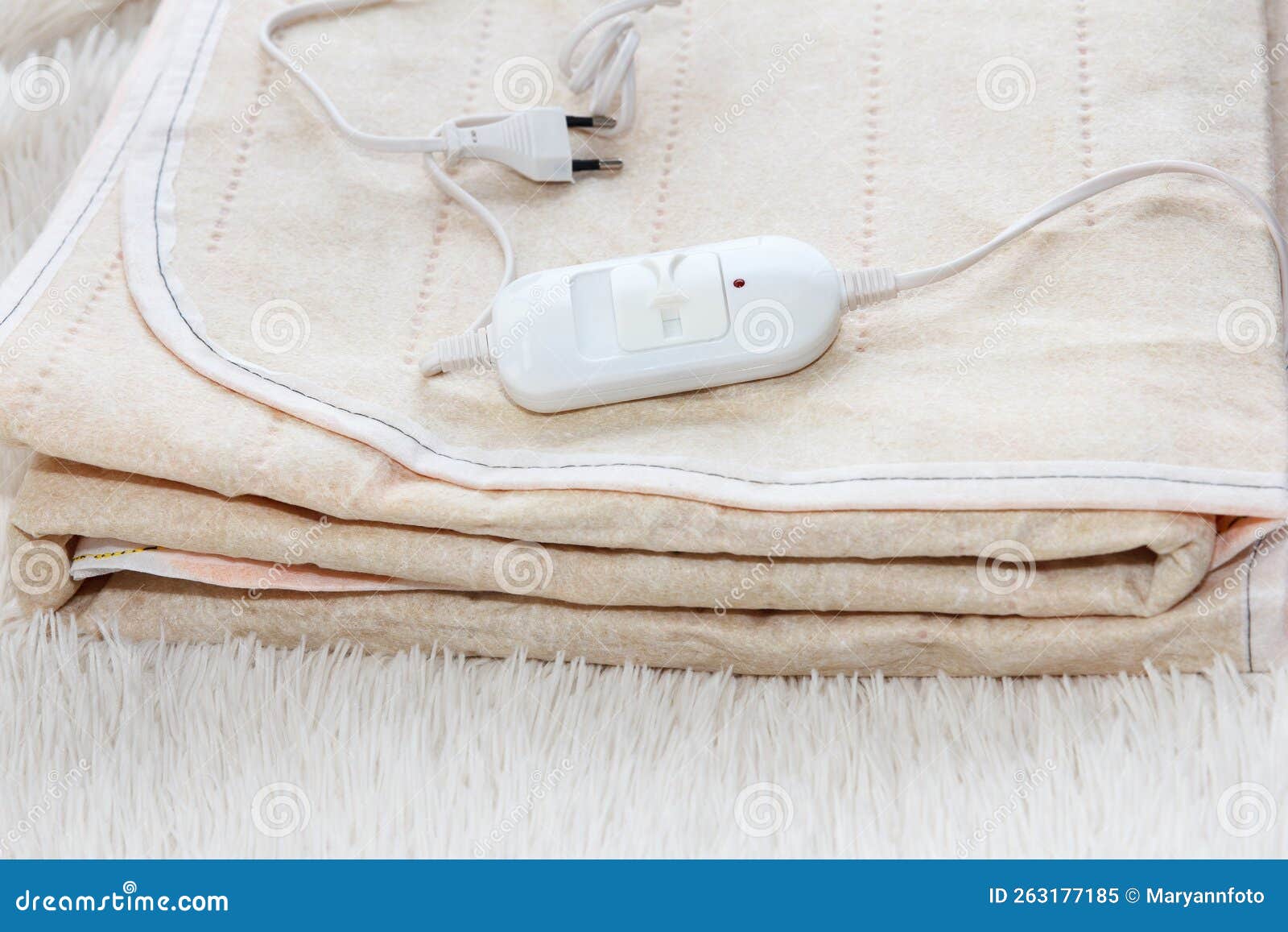 Warm Soft Twosided New Electric Sheet, Lies Assembled, and on Top of