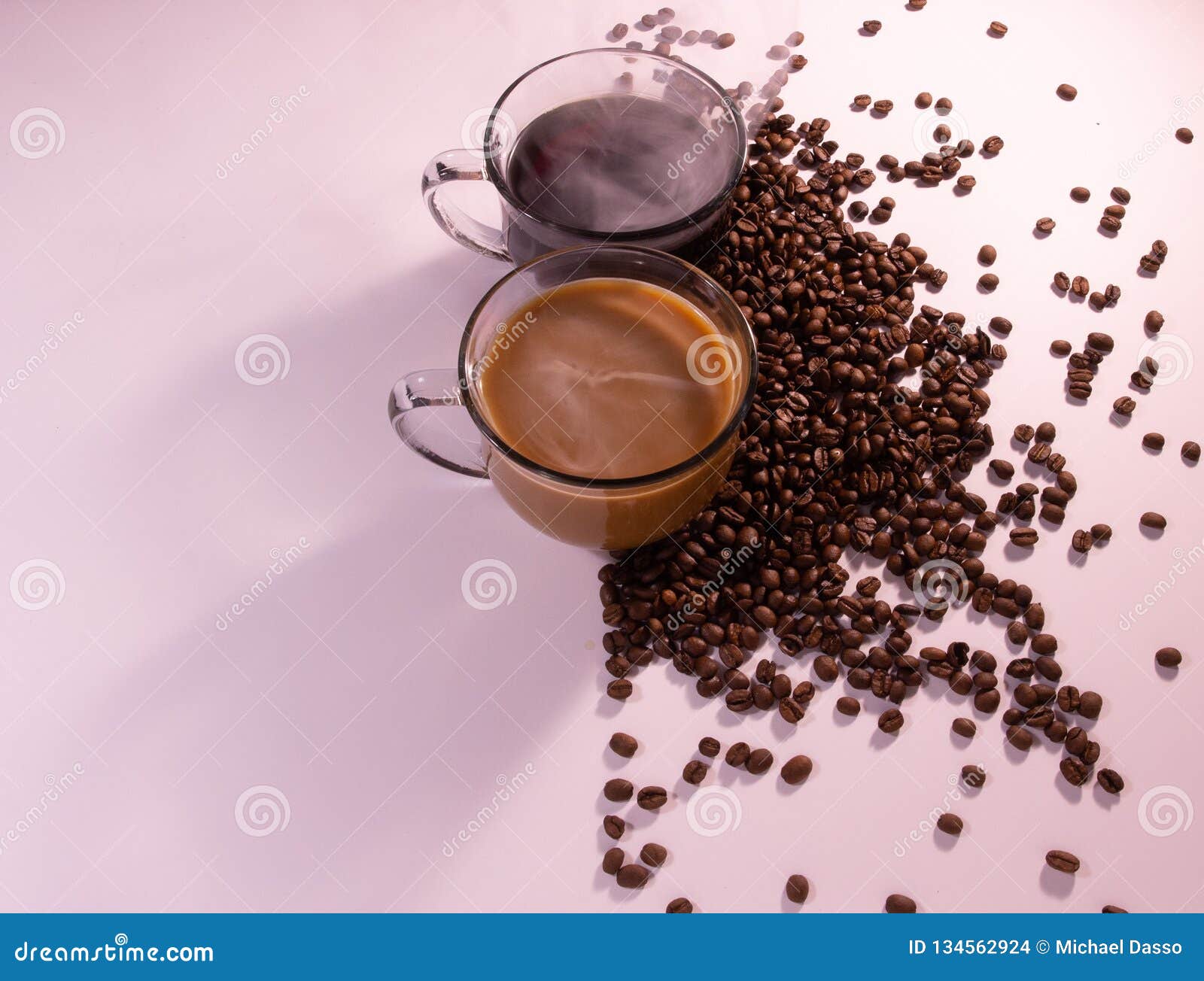 Warm Steaming Coffee Cups with Coffee Beans in Morning Light with