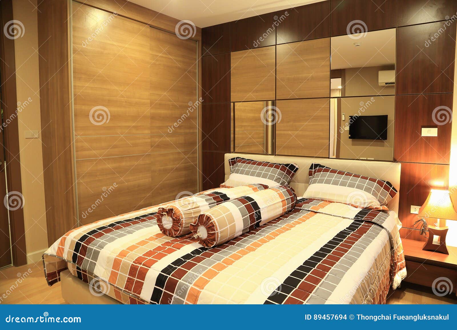 Warm Tone Of Luxury Interiors Design Of The Bedroom In