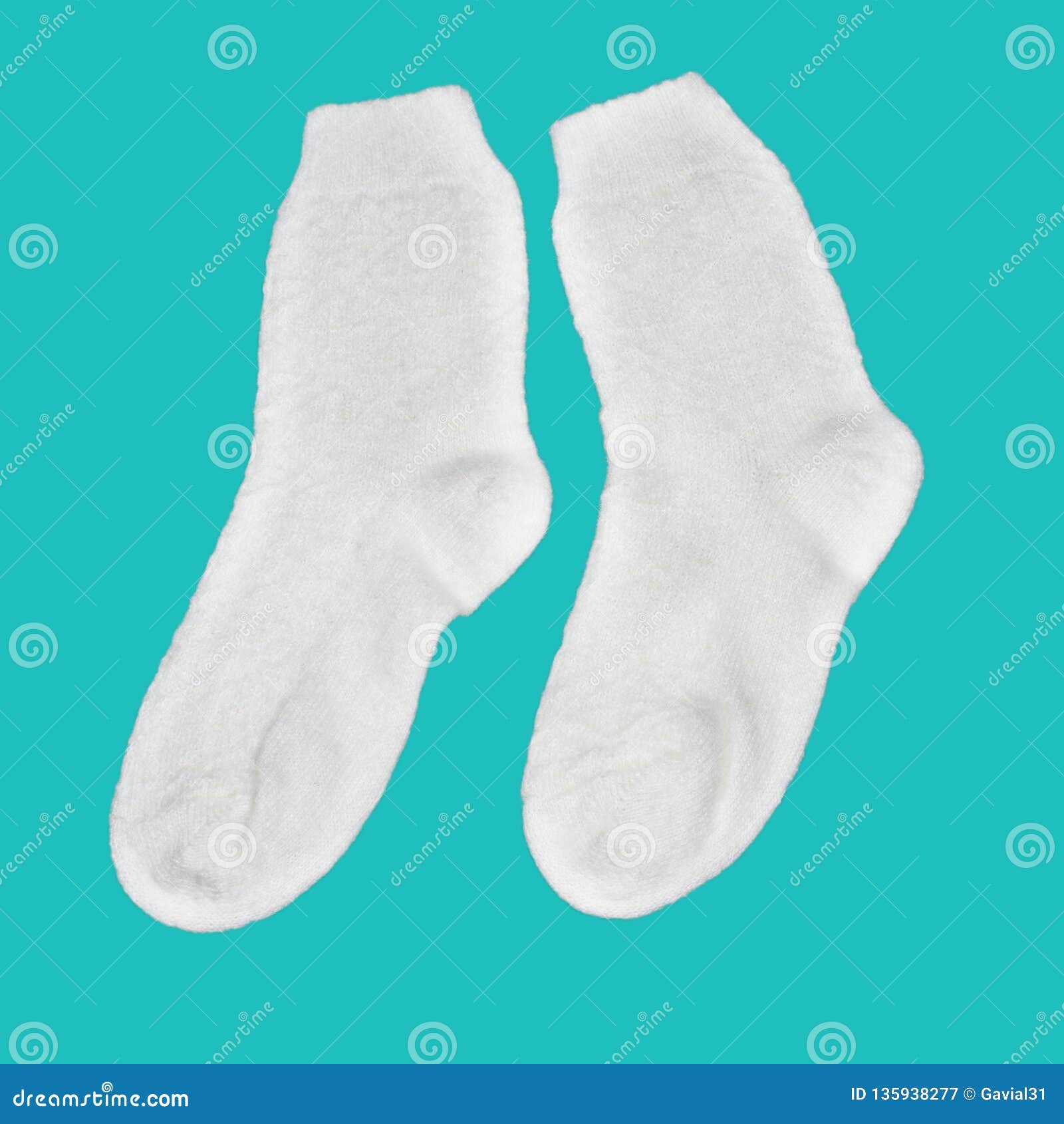 Warm, White Knitted Socks, Isolated on a Turquoise Background. Stock ...