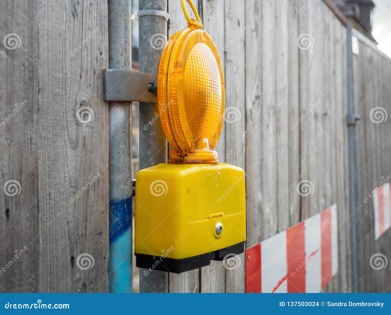 A Warning Light of a Construction Site in the City Stock Photo Image
