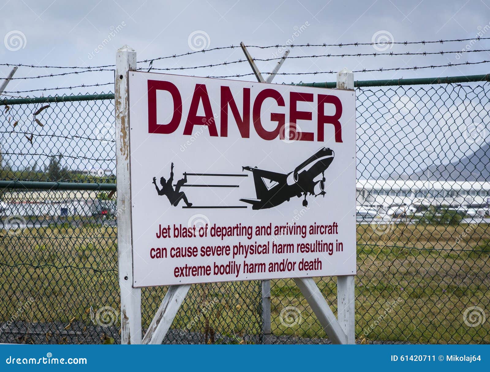warning sign at airport on saint martin island near moho beach