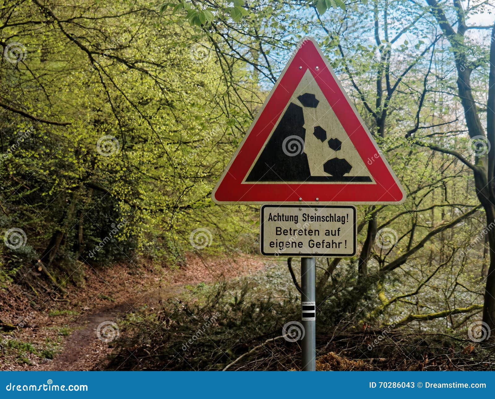 Warning Sign at a German Hiking Trail about Rockfall Stock Image