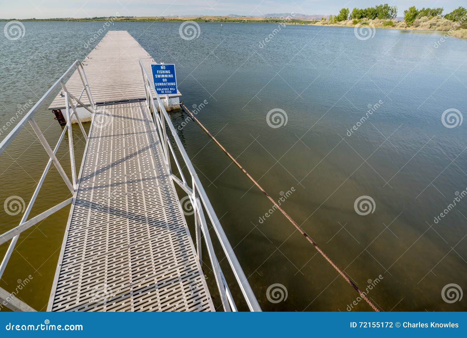 Warning Sign on Lake in Idaho with Doc Stock Photo Image of water