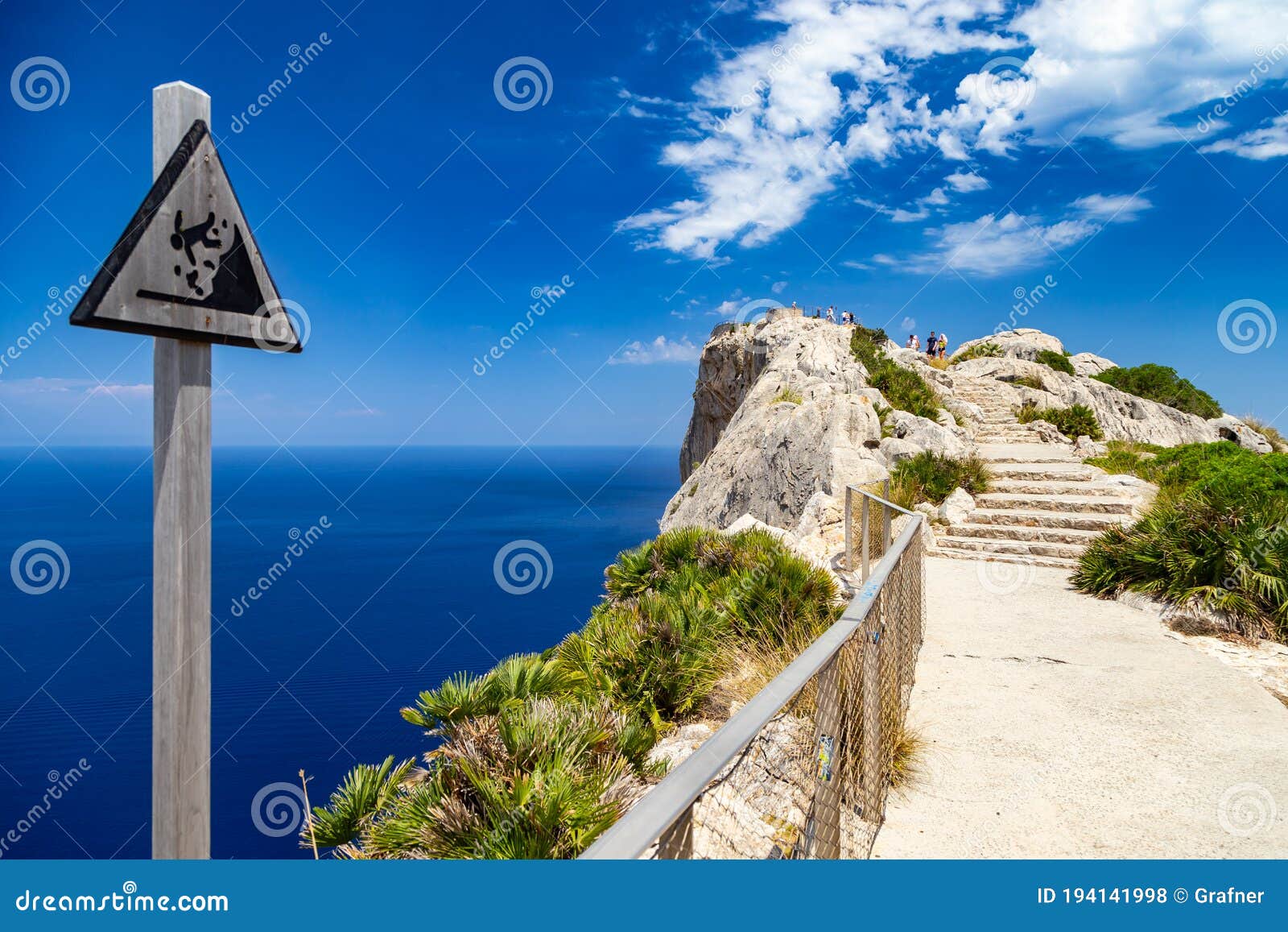 warning sign at vantage point with view mirador es colomer on punta nau at cap formentor majorca mallorca. balearic islands