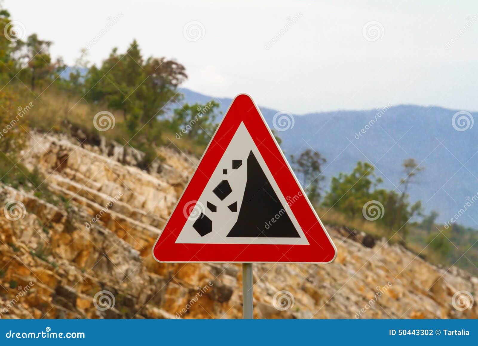 Warning Stone Fall Road Sign On Mountain Road Stock Photo Megapixl
