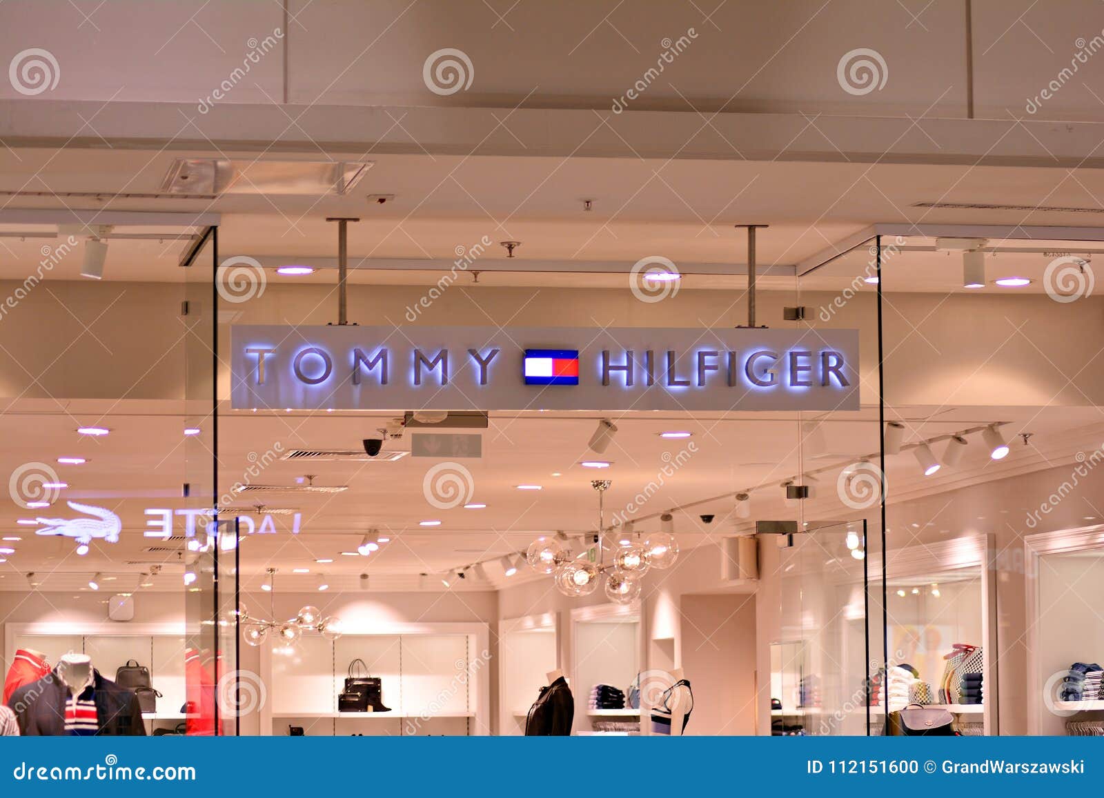 Sign Tommy Hilfiger . Company Signboard Tommy Hilfiger . Editorial ...