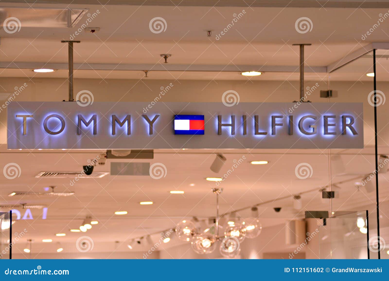 salami amplifikation forligsmanden Sign Tommy Hilfiger . Company Signboard Tommy Hilfiger . Editorial  Photography - Image of hanging, brand: 112151602