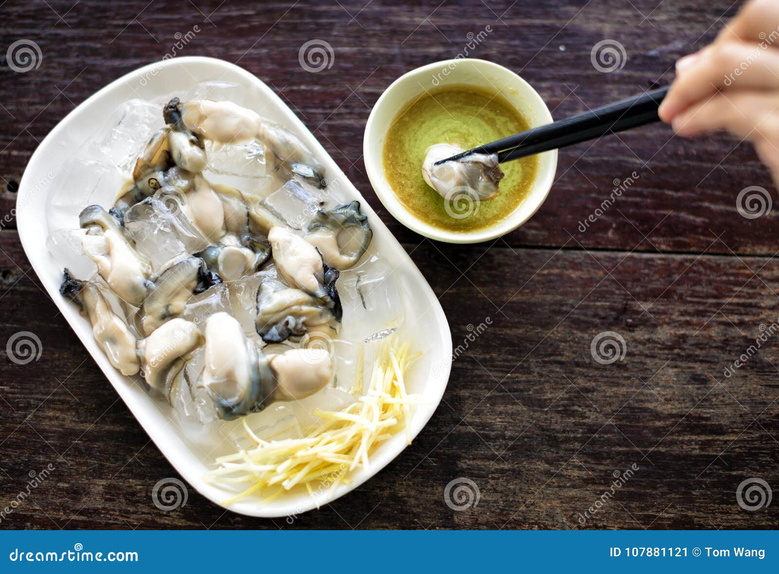 Wasabi and fresh Oysters stock image. Image of mollusk 107881121
