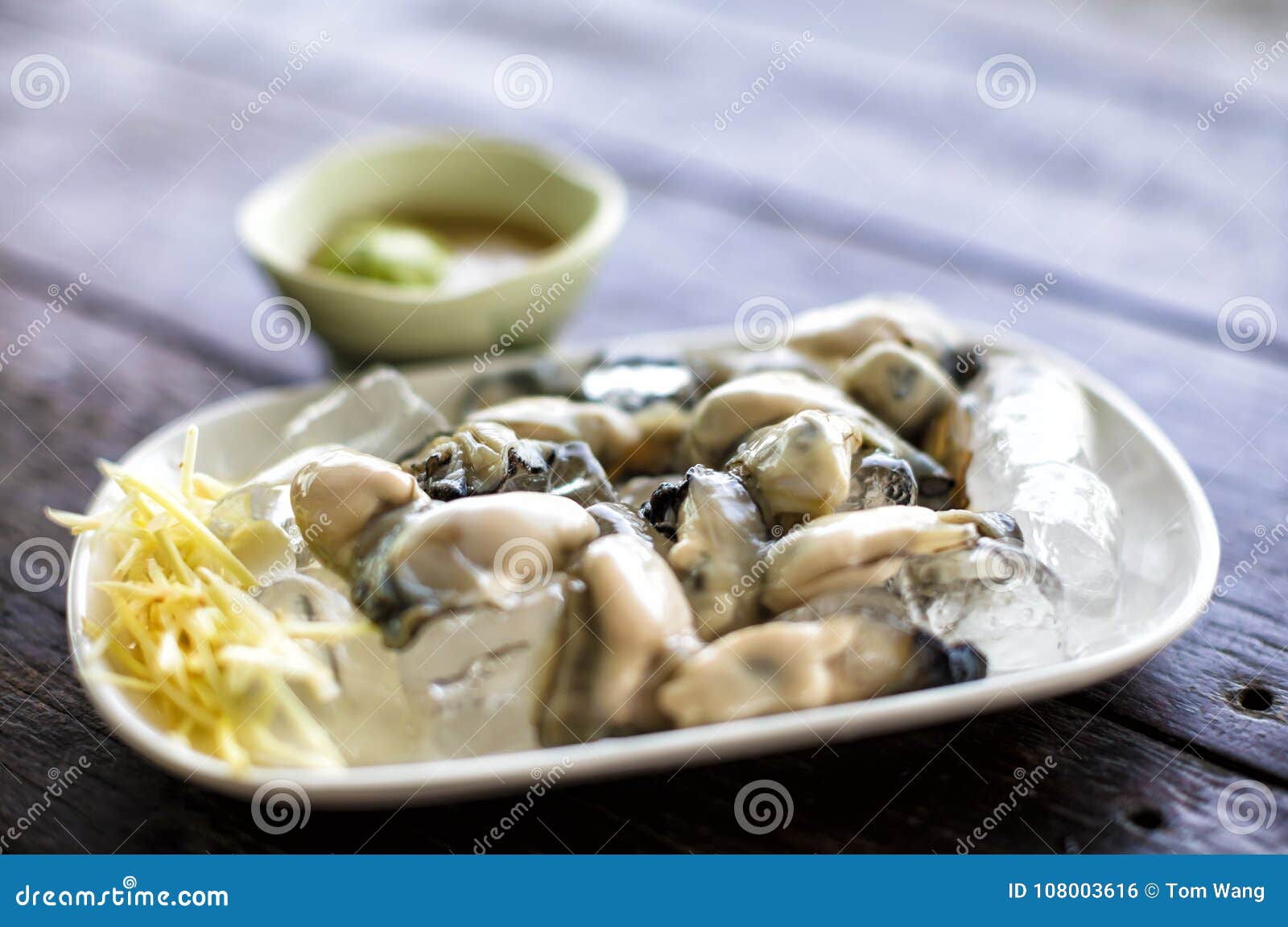 Wasabi and fresh Oysters stock photo. Image of dish 108003616