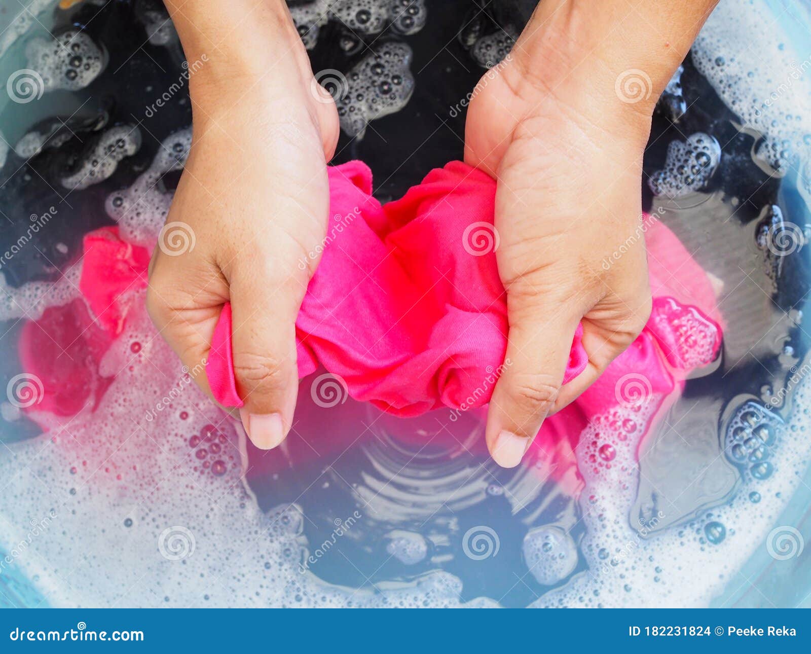 Wash Color Clothes With Hand And Soak Cloth In Laundry ...