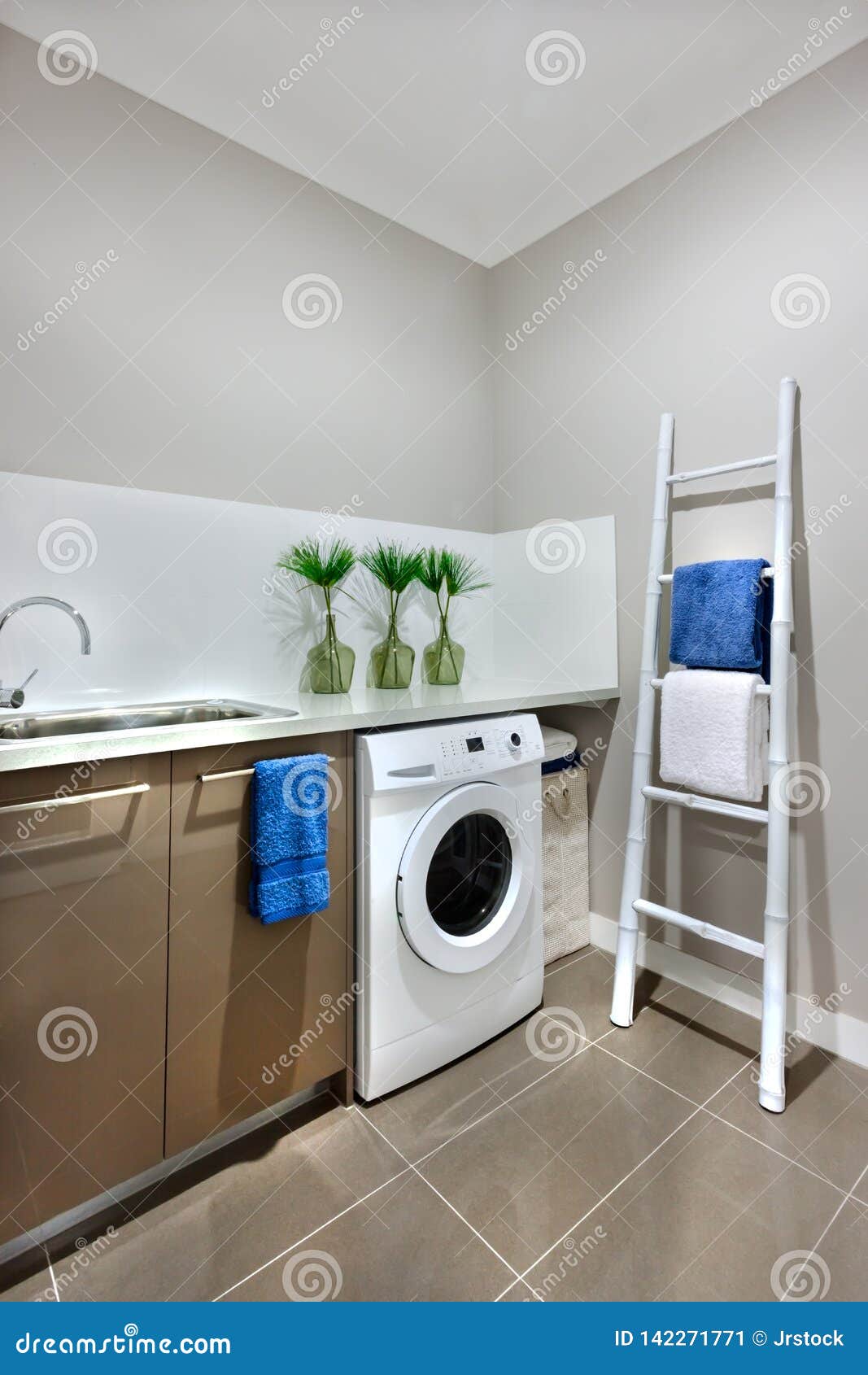 A Washing Area With A Washing Machine Of A Modern House Stock