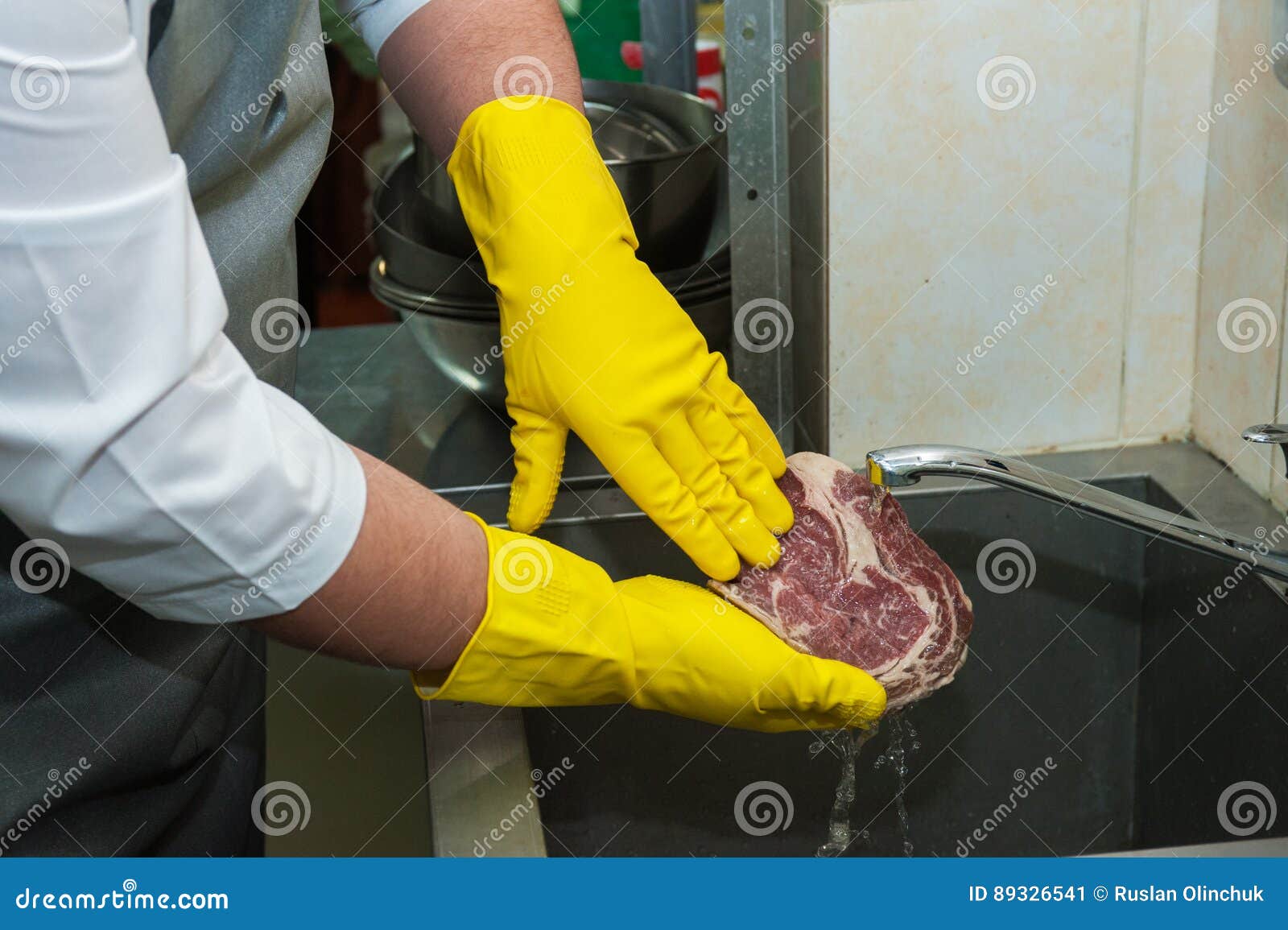 Washing and cleaning meat stock image. Image of cooking 89326541