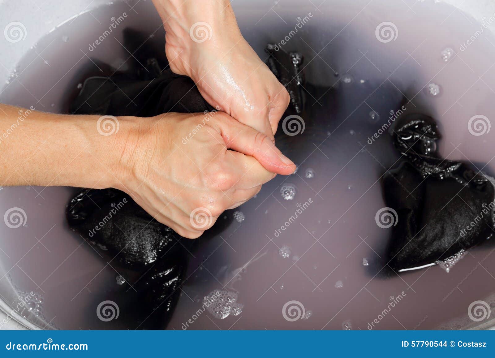 Washing clothes stock photo. Image of hygiene, home, rinsing - 57790544