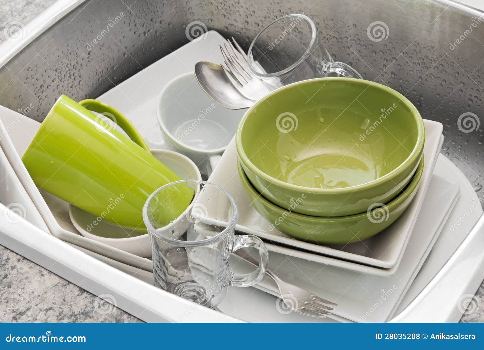 Washing Dishes in the Kitchen Sink Stock Photo Image of contemporary