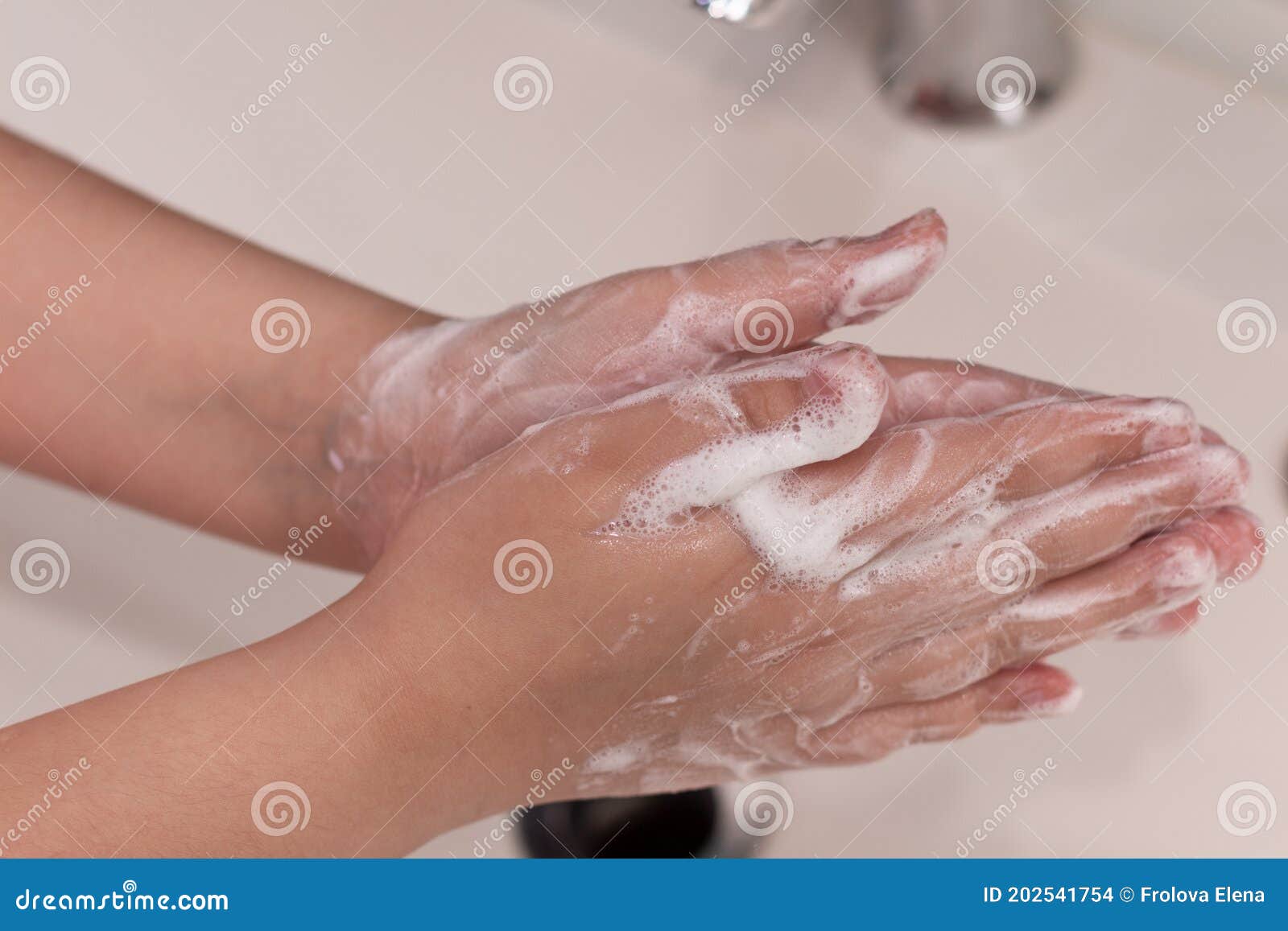 washing hands with soap foam