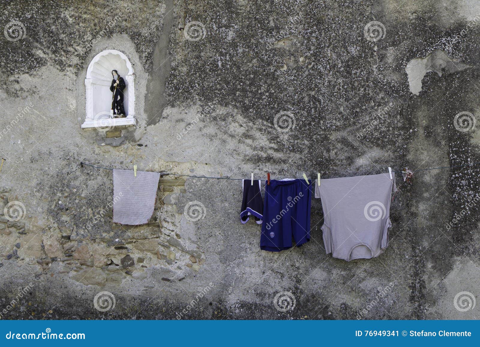 Washing Hanging To Dry Outside a Wall Stock Image Image of street