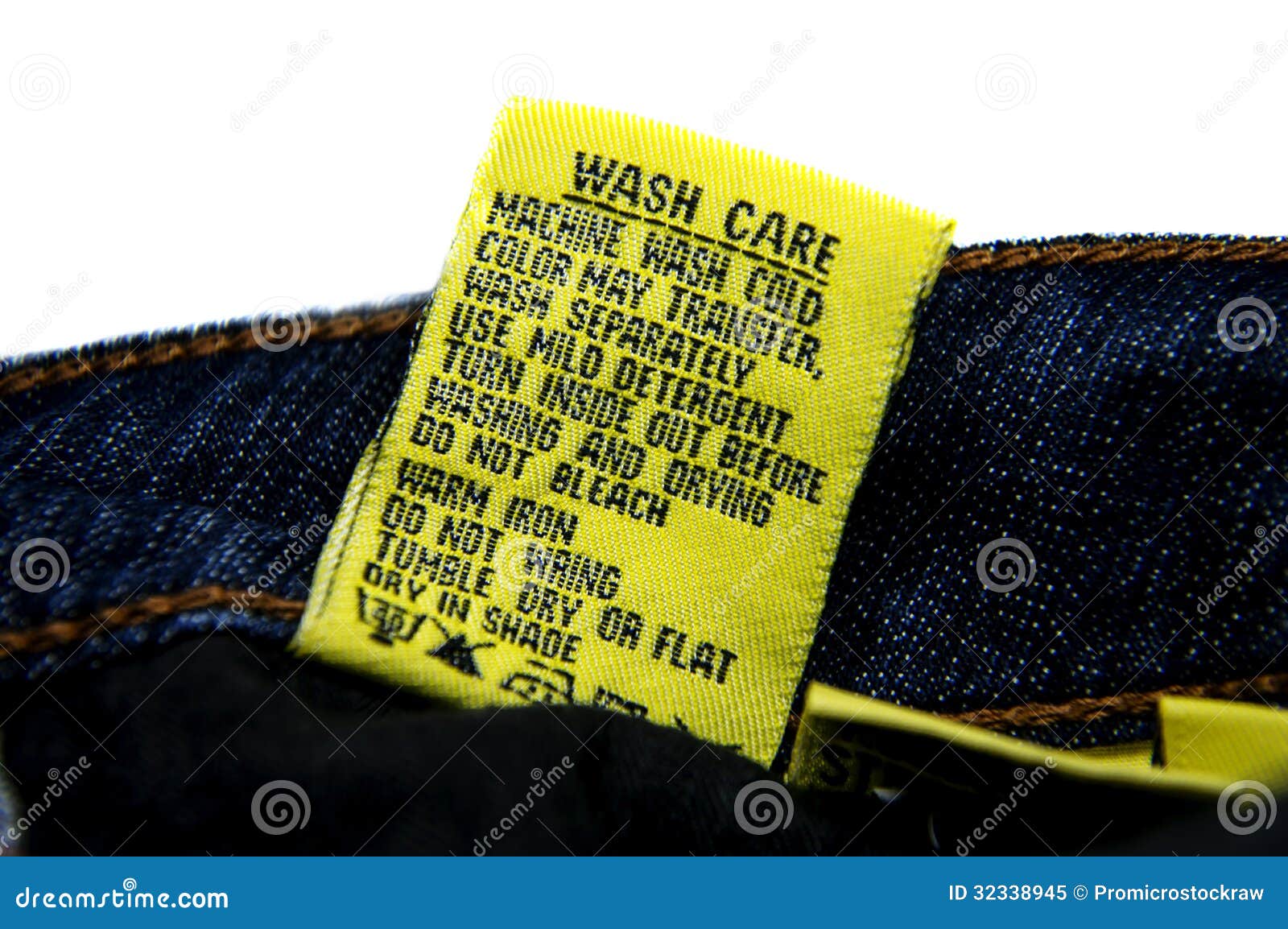 Washing Jeans Instructions stock image. Image of detail - 32338945