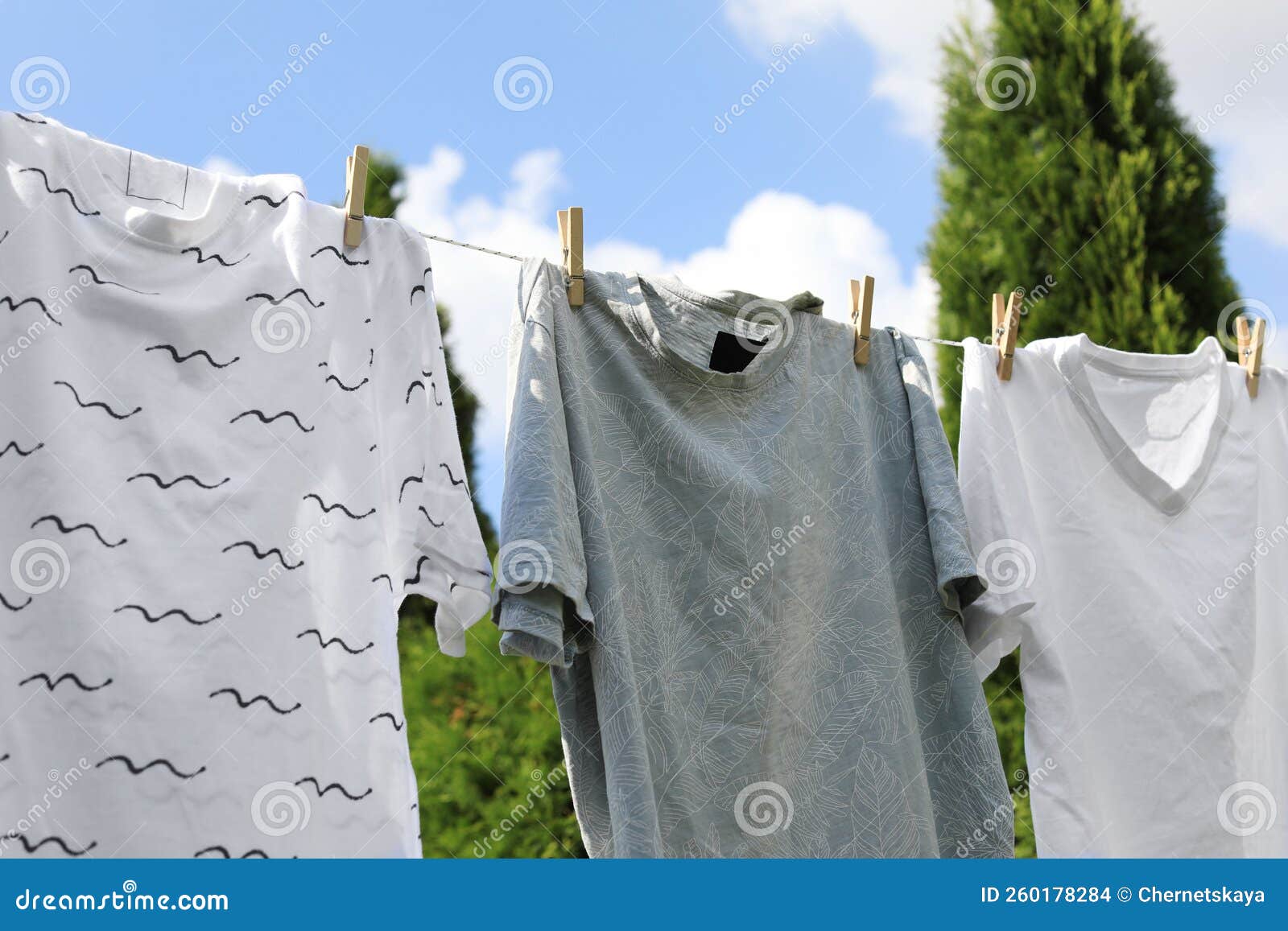 Washing Line with Clean Clothes Outdoors. Drying Laundry Outside Stock Photo Image of clamp