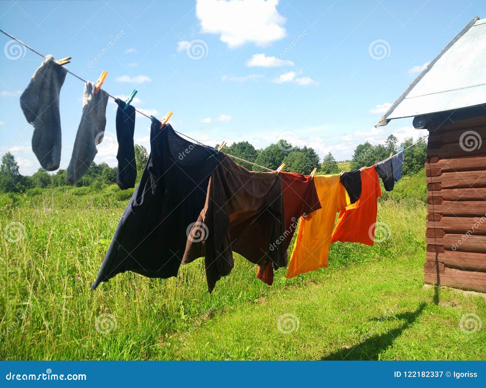 Washing Line with Drying Clothes in Outdoor. Stock Image - Image