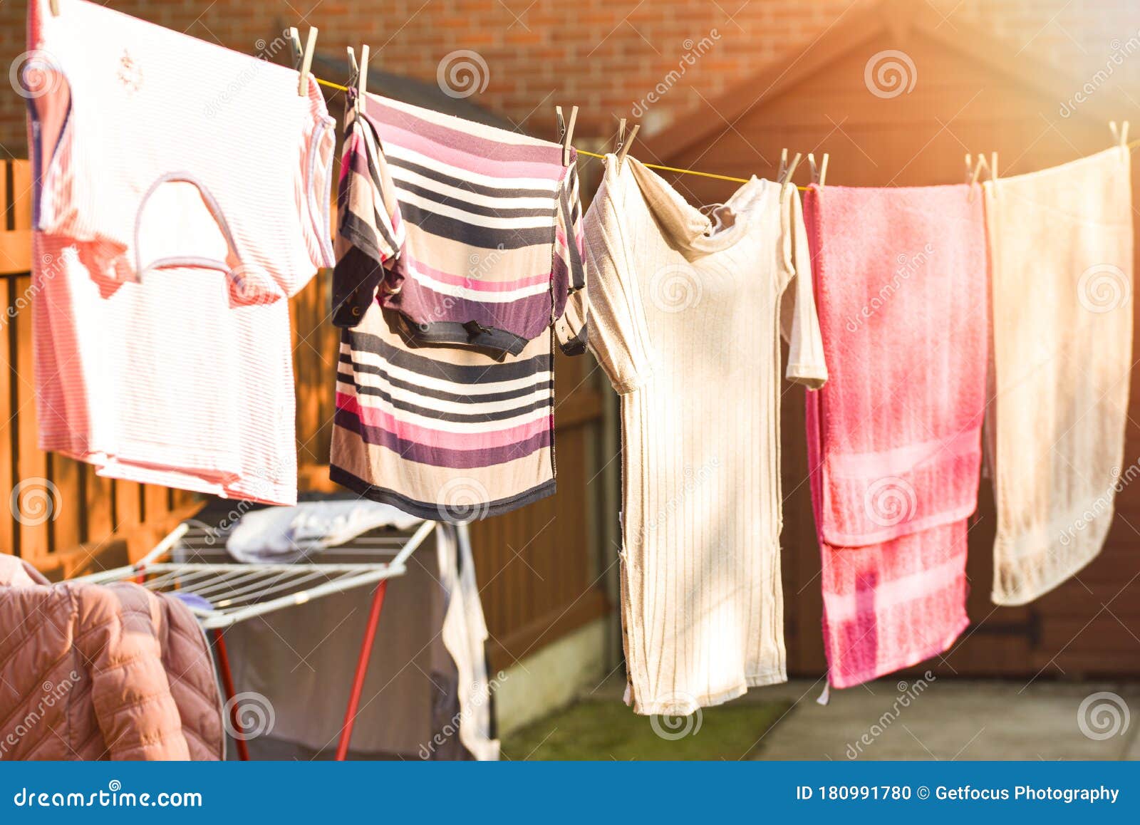 Washing Line with Drying Clothes in Outdoor Stock Photo - Image of