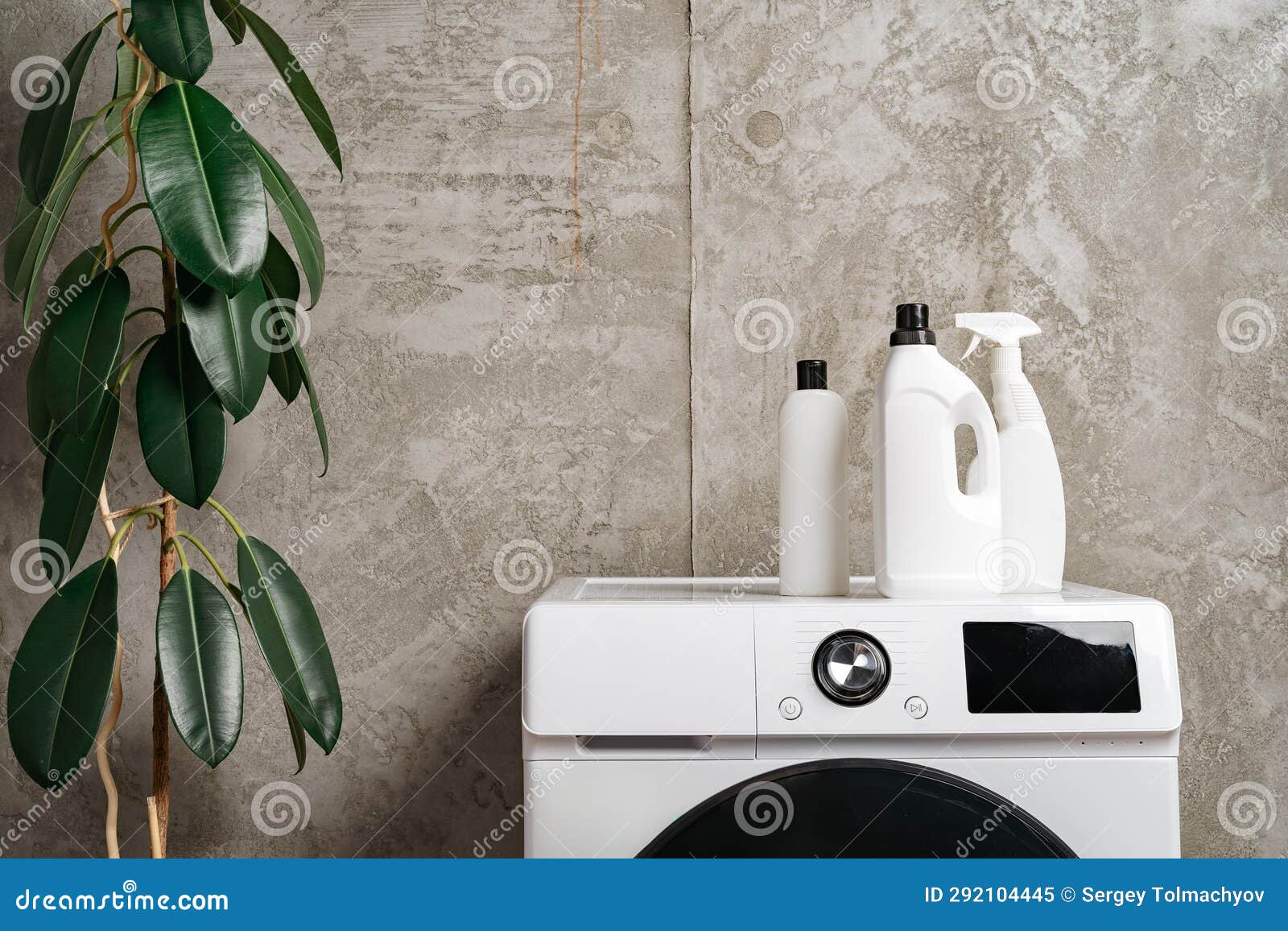 Washing Liquid Detergents on Washing Machine in a Laundry Room Stock