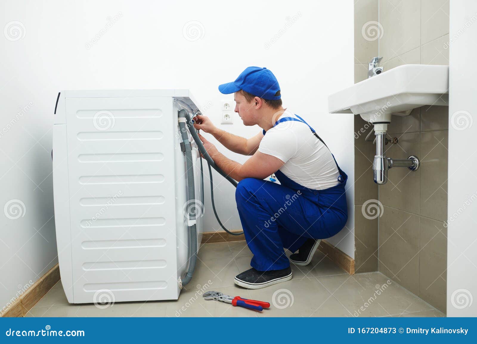 washing machine installation or repair. plumber connecting appliance