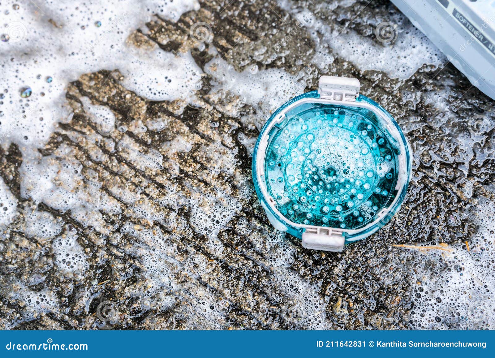 The Washing Machine`s Dust Filter is Placed on the Cement Floor