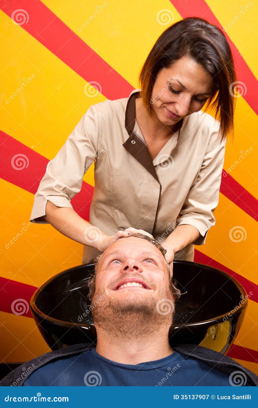 washing man hair in beauty parlour hairdressing salon