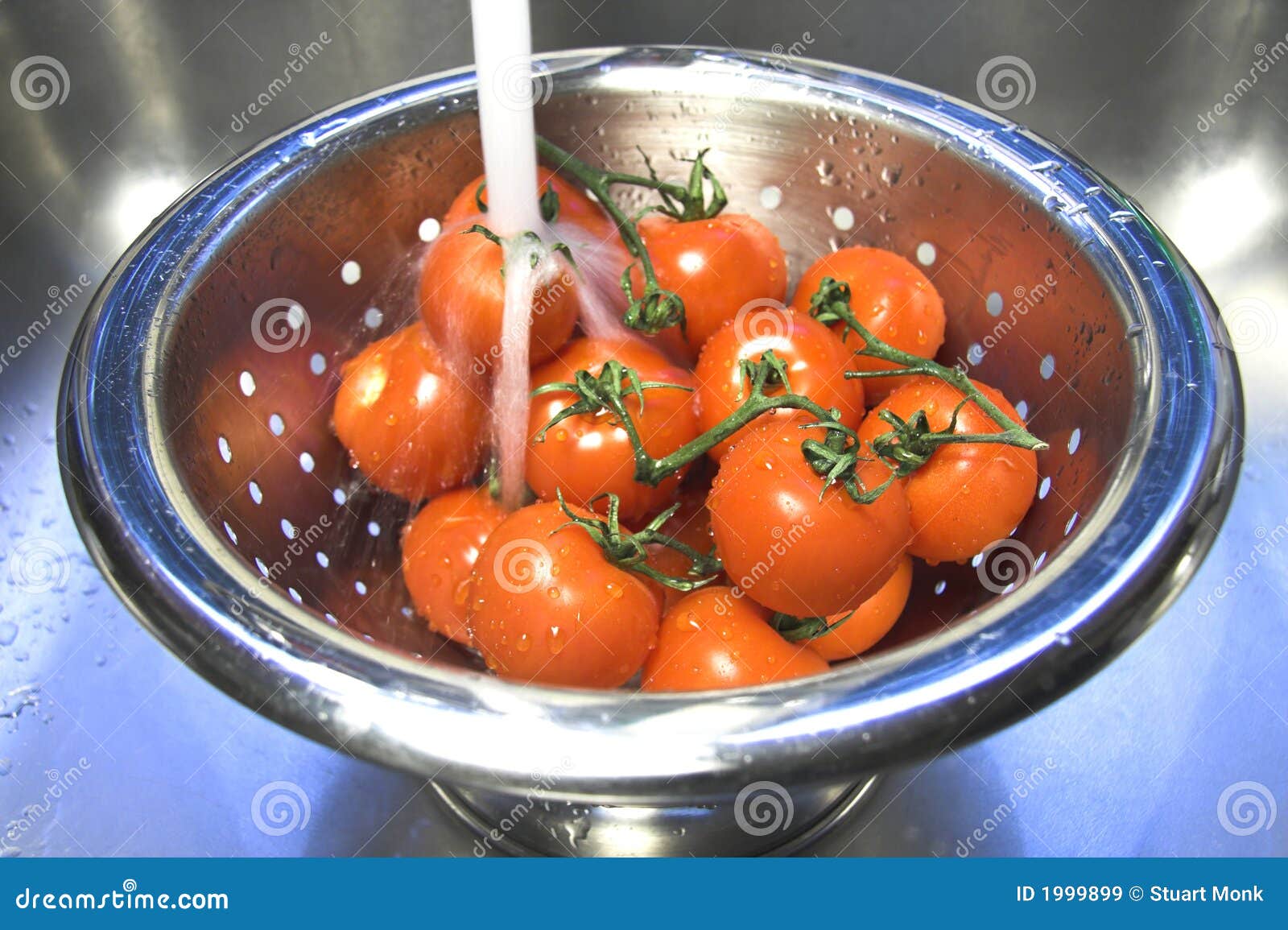 Washing tomatoes stock image. Image of clean, healthy 1999899