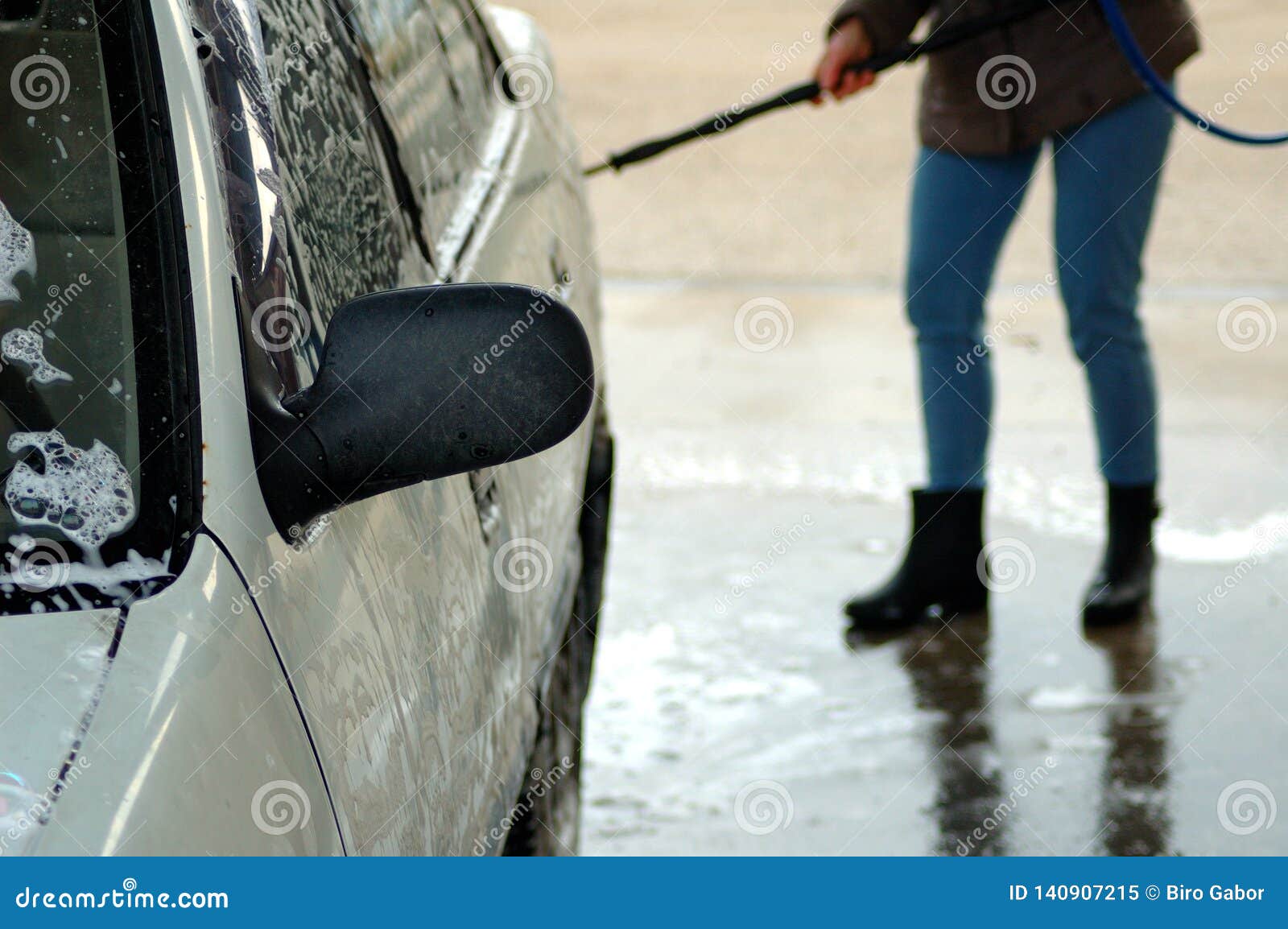 Washing a White Car. Women in the Background Stock Image Image of