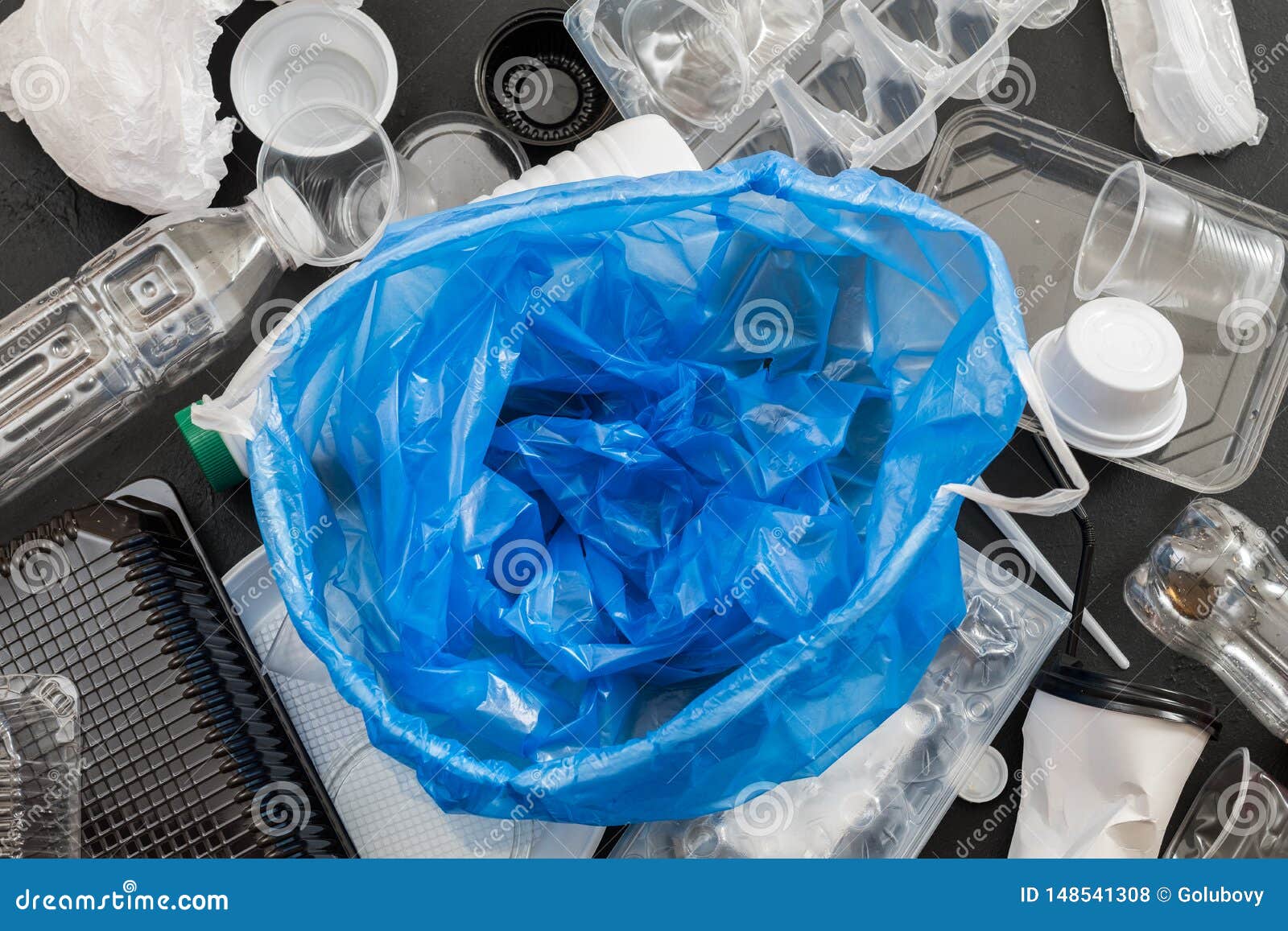 Recycle logo on bins in form of local council authority blue & white  plastic bag sacks for waste management recycling of garbage rubbish England  UK Stock Photo - Alamy