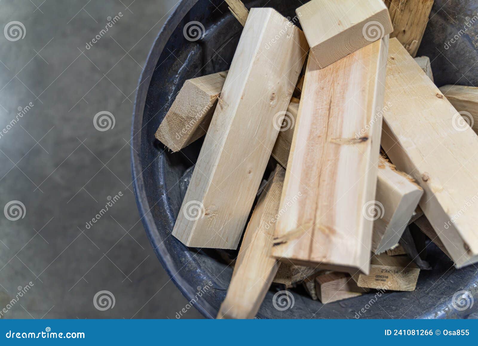 Waste Pieces of Wood from Making Crates in Bin for Disposal Stock Photo