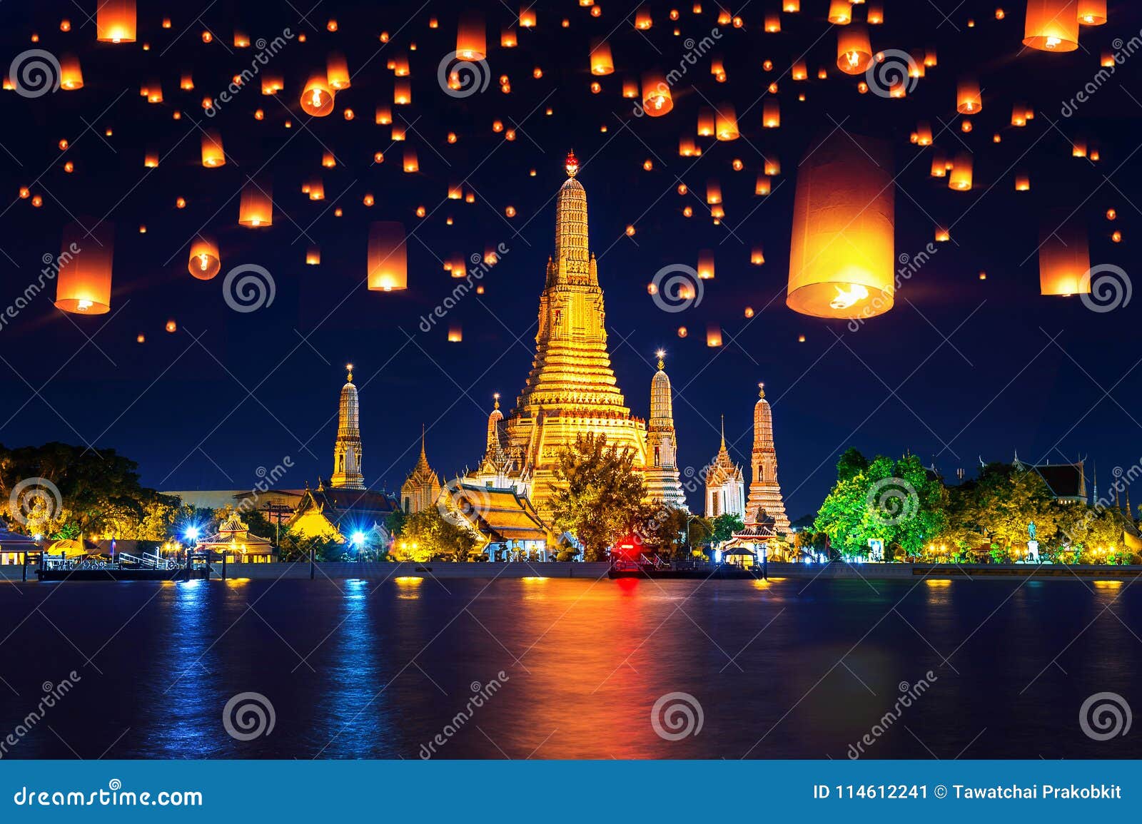 wat arun temple and floating lantern in bangkok, thailand