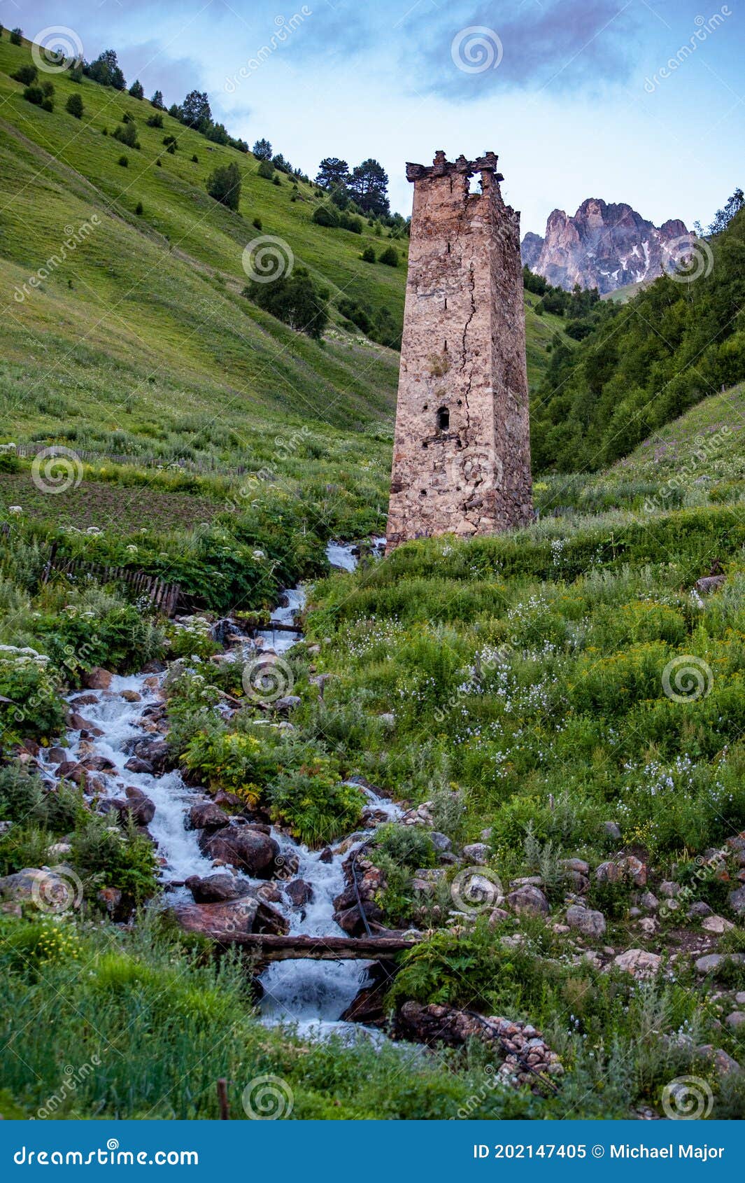 watch tower and stream in village of adishi, svaneti, georgia