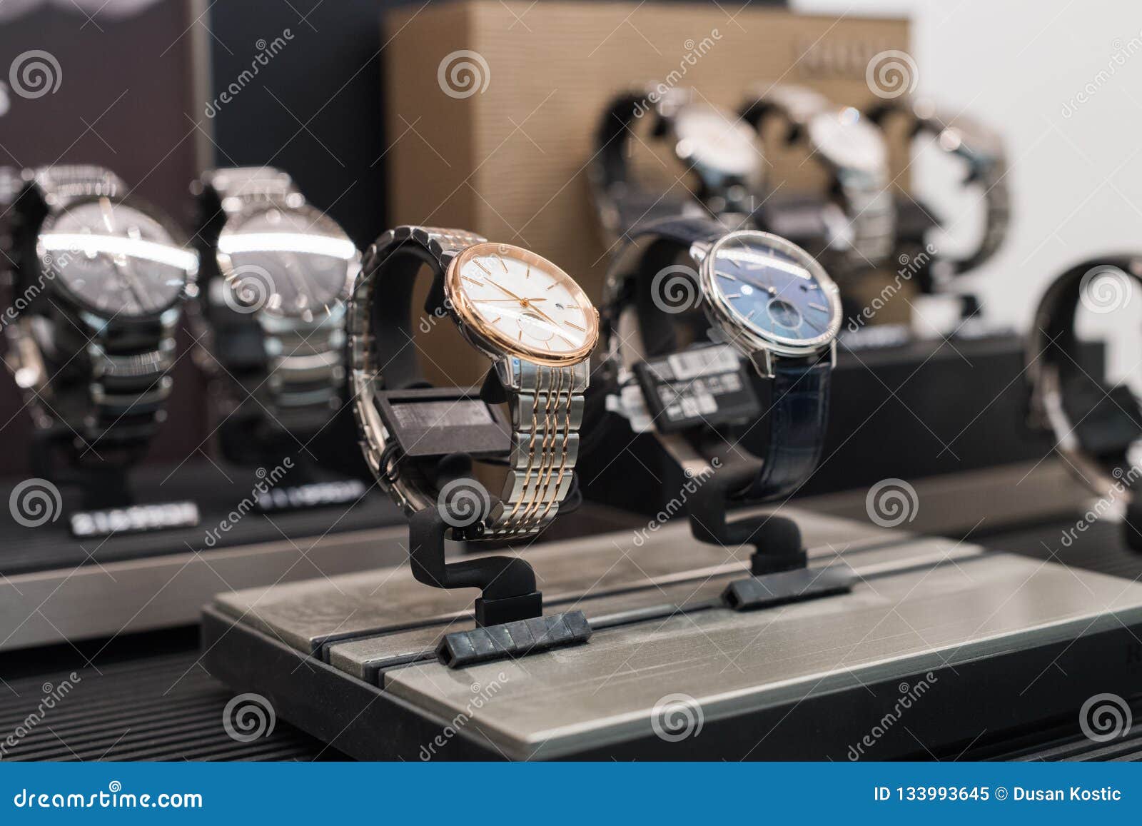 Watches in a luxury store stock image. Image of retail - 133993645