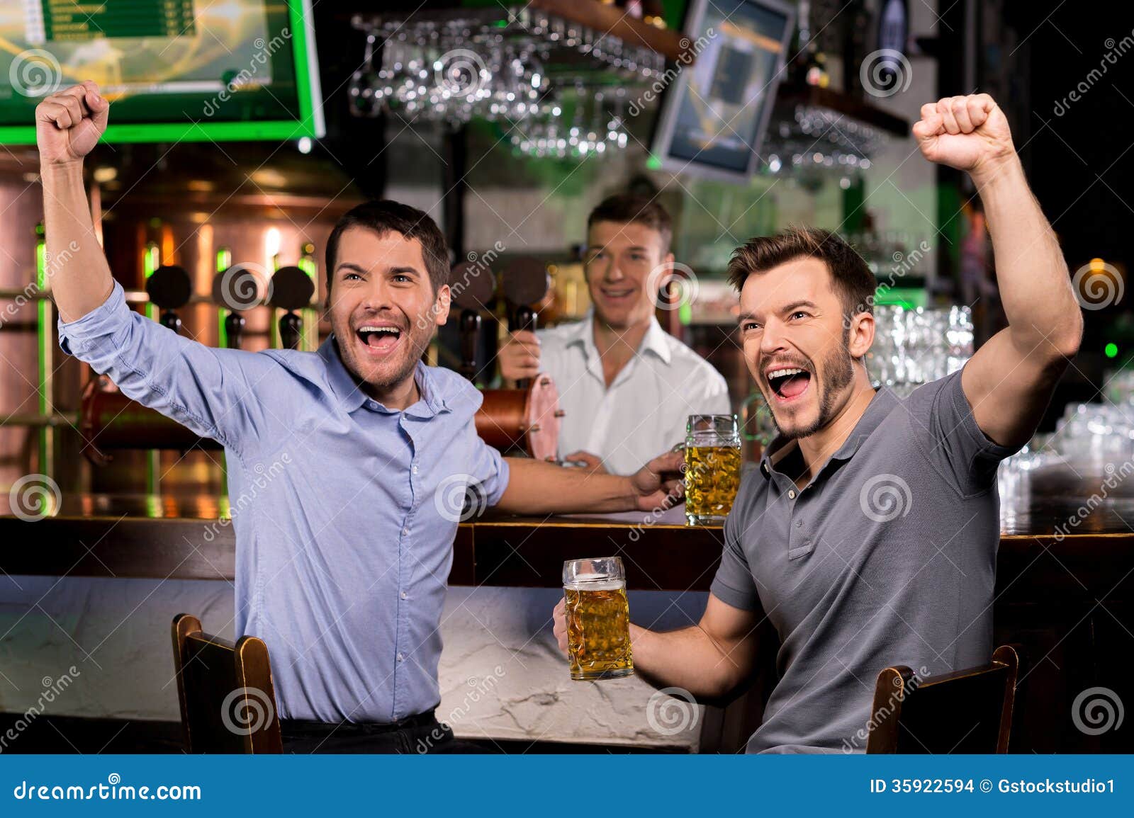 Watching TV In Bar. Stock Images - Image: 35922594