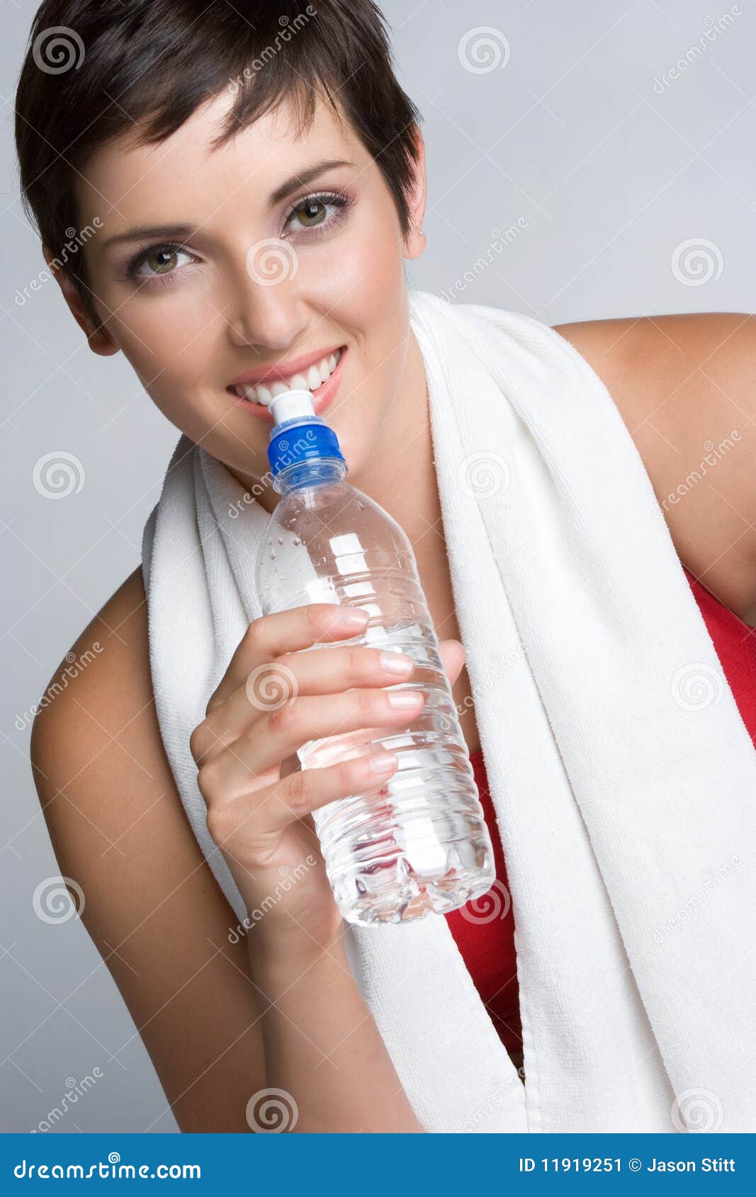 Woman Workout At Home With Water Bottles High-Res Stock Photo