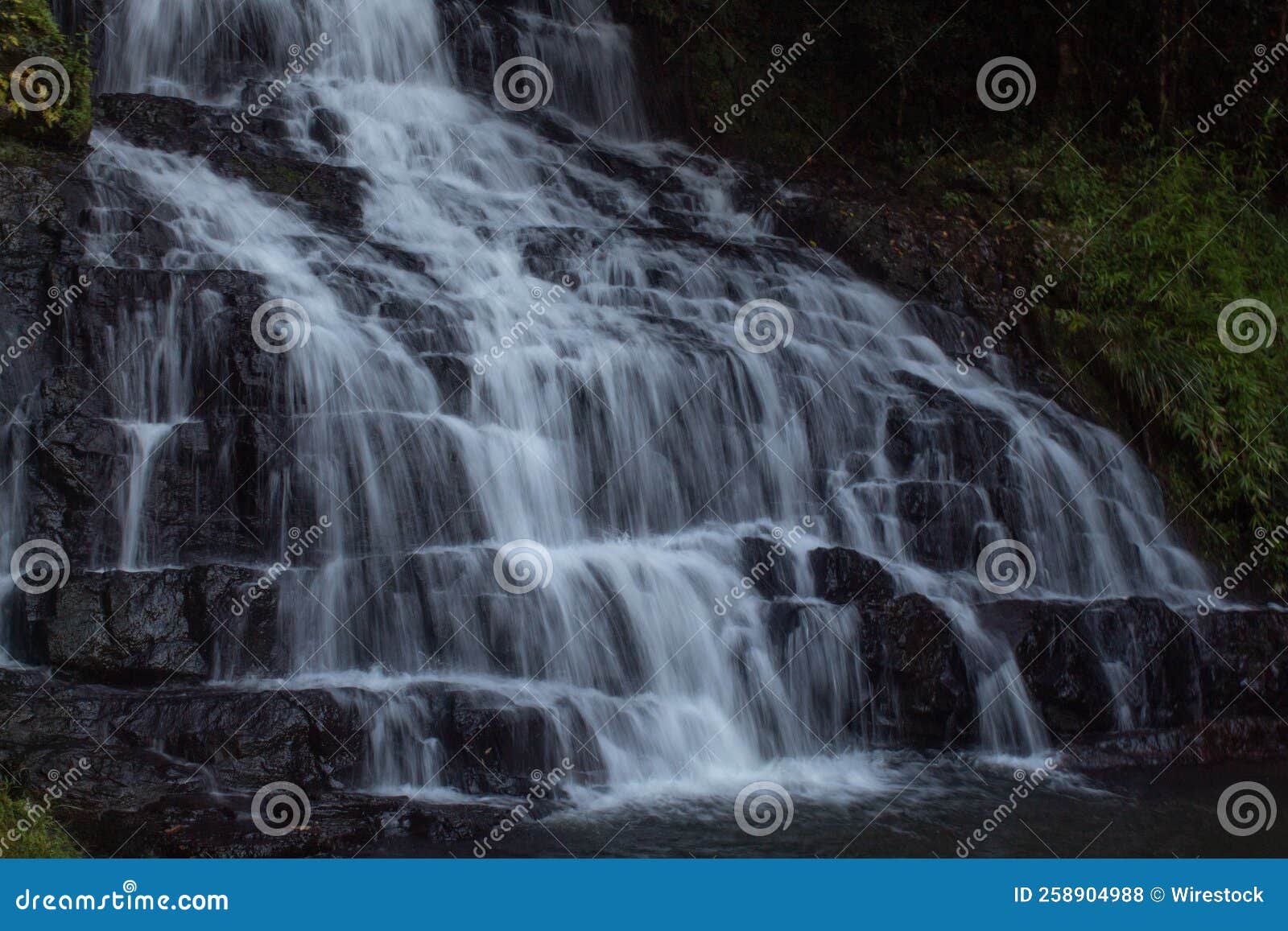 Water Cascading Over Rocky Cliffs Stock Photo Image of cliff, geology