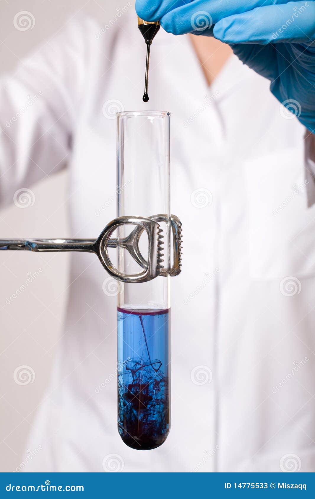water contamination test, tube witb blue liquid