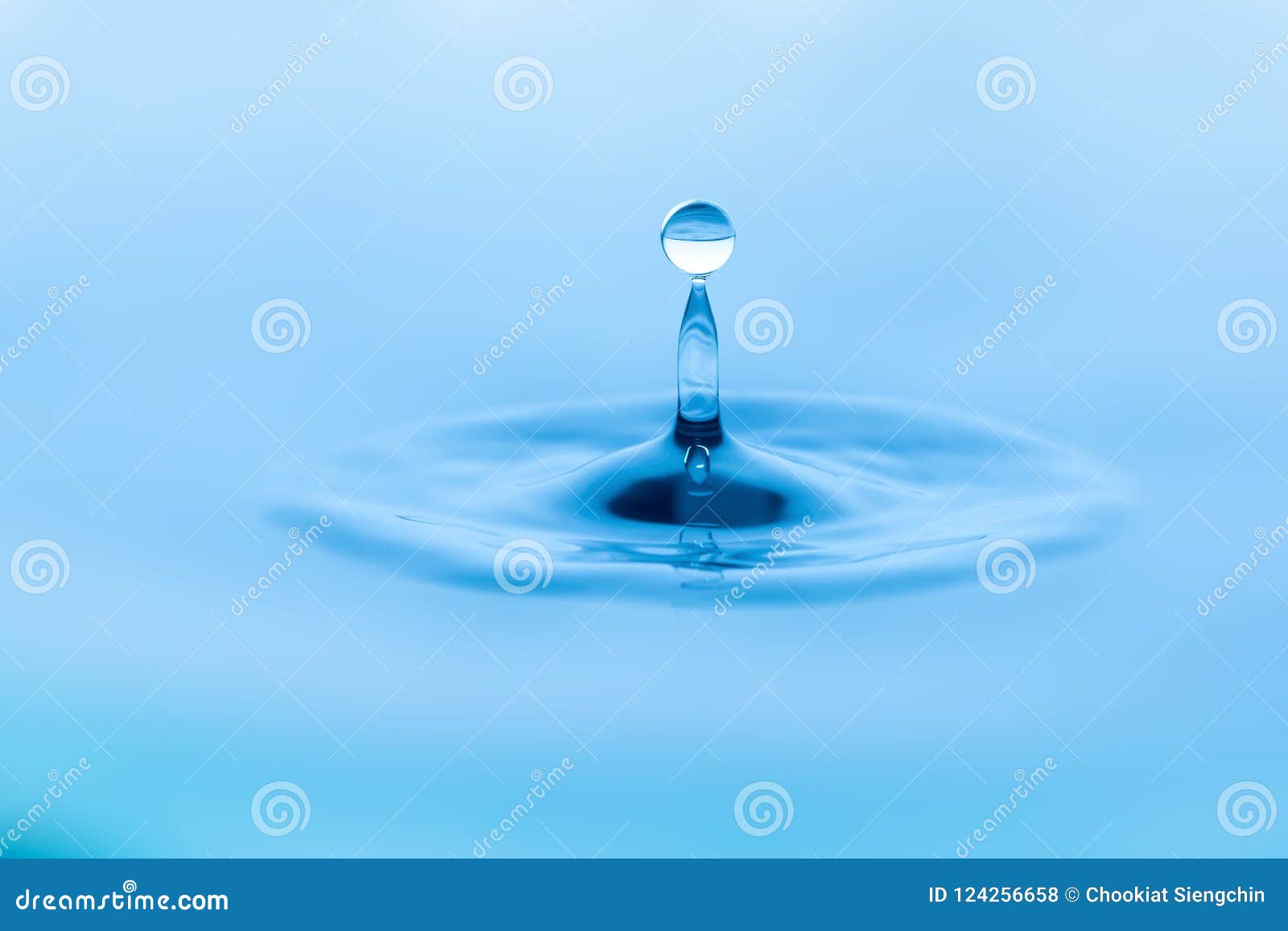 Pure Drinking Water Is Poured Into Transparent Glass. World Water Day