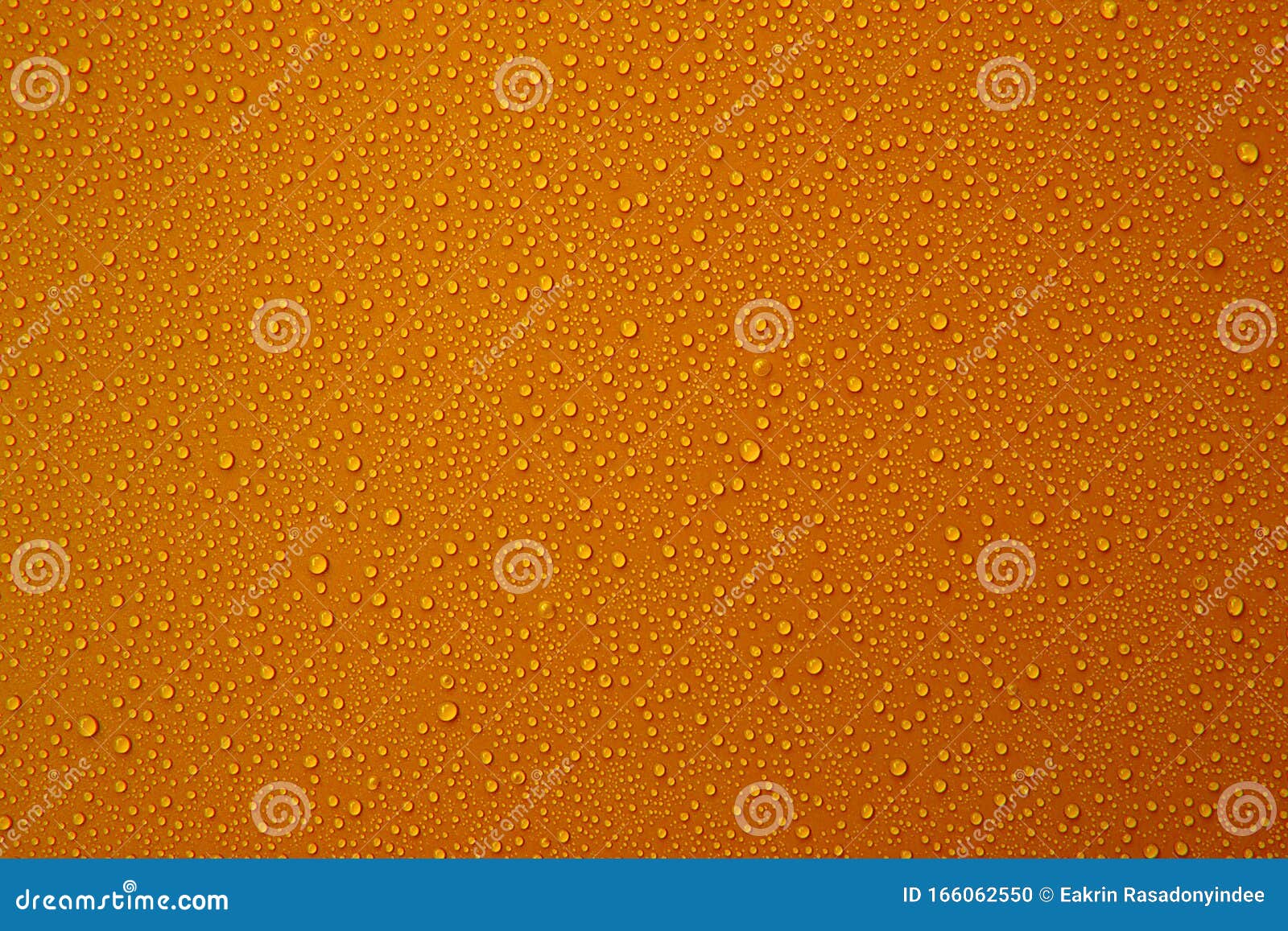 Water Droplets on the Orange Color Background. Stock Photo Image of