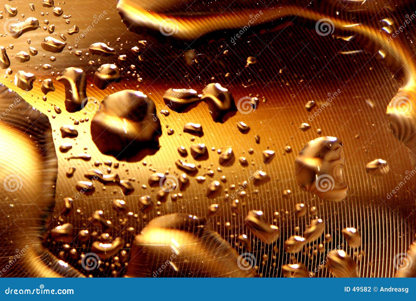 Water drops deep gold stock photo. Image of rain, surreal 49582