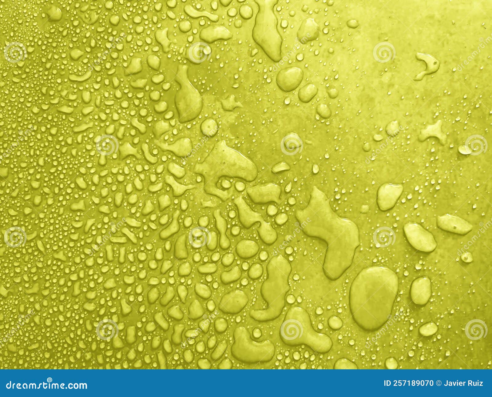 water drops of different sizes on a yel surface, drops texture, rain on lime tile, rain texture, yellow refreshing background,