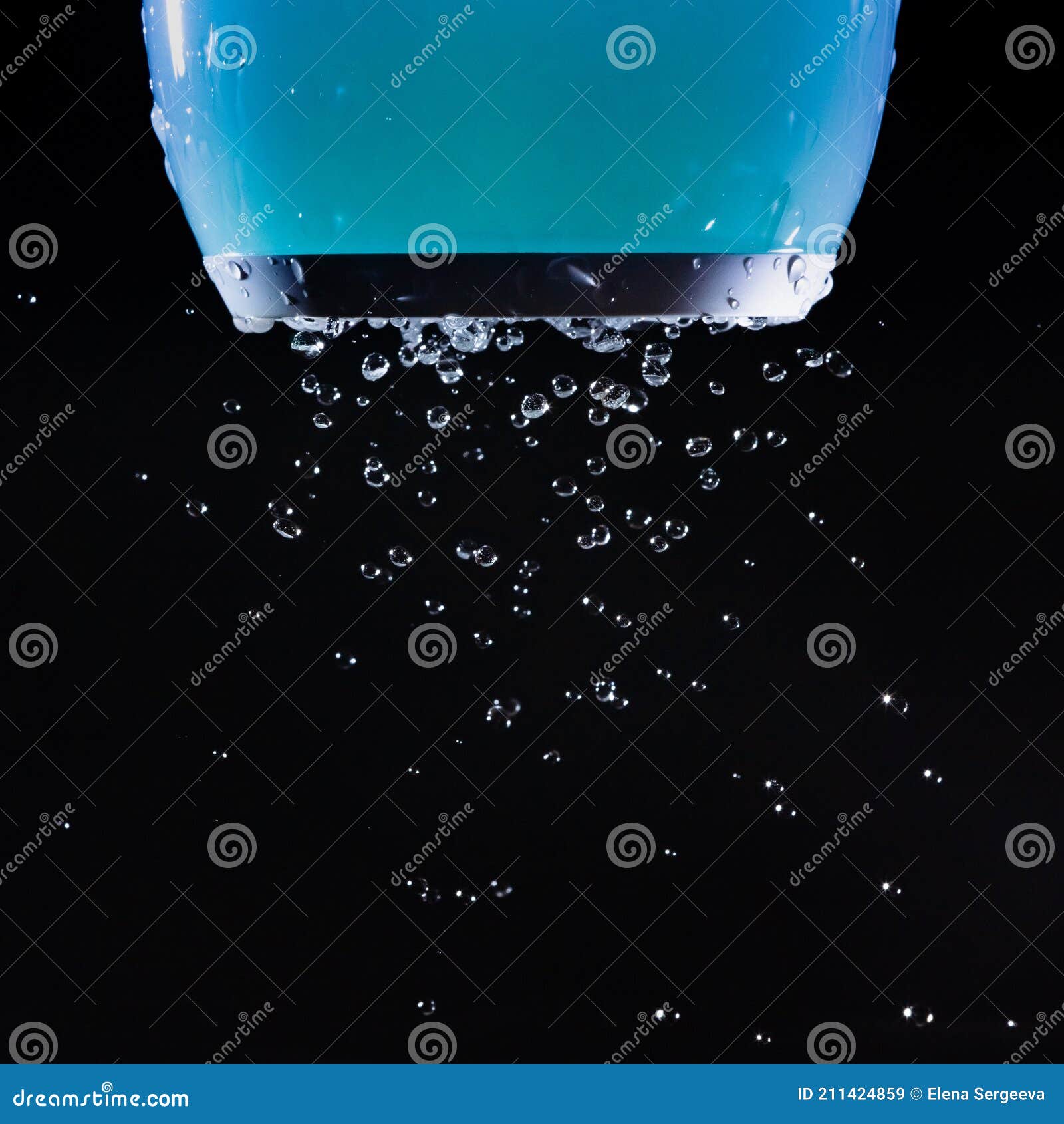 jbl music speaker on dark background with water drops