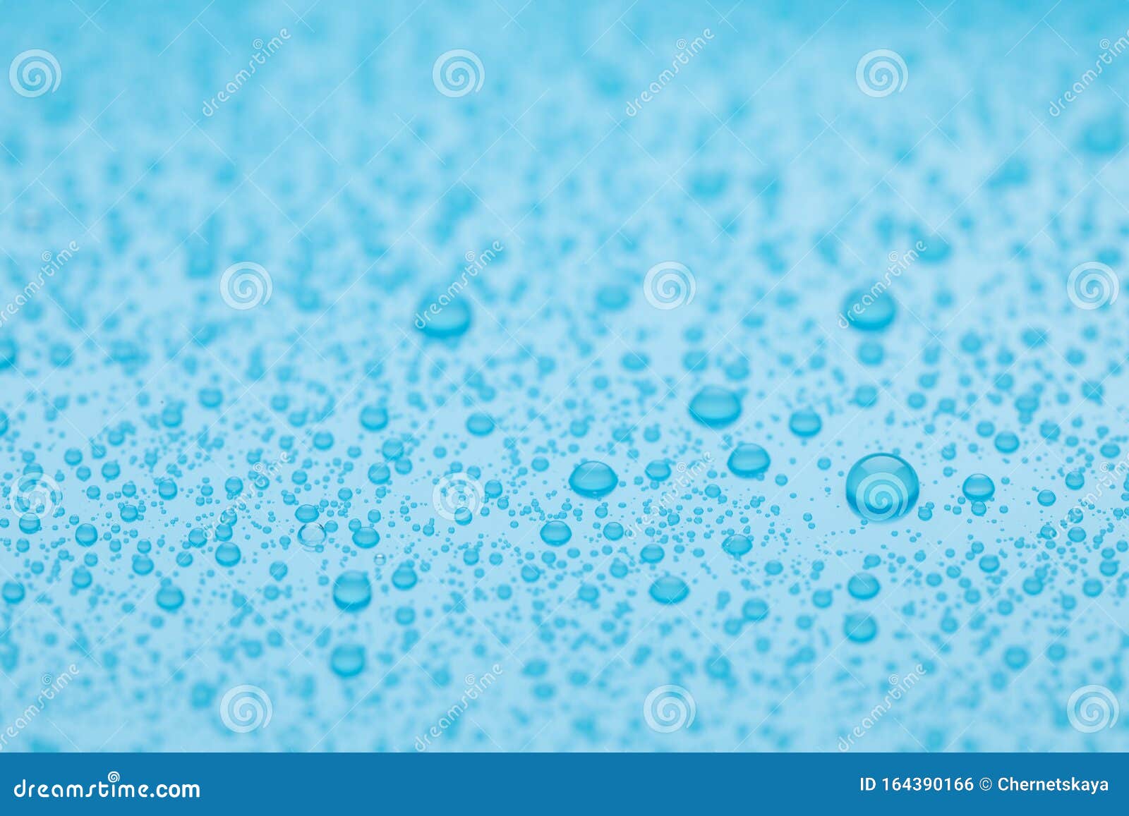 Water Drops on Light Blue Background, Closeup Stock Photo Image of
