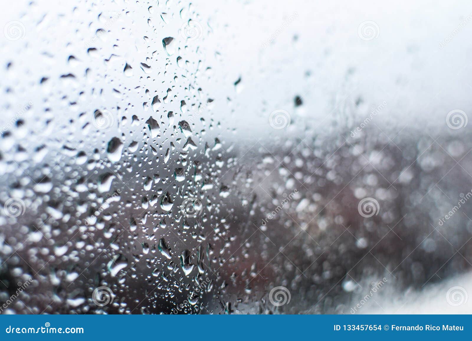 Water Drops, Rain Drops on Glass and Dripping Down Stock Photo Image