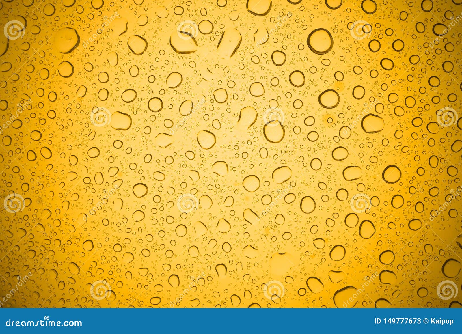 Water Drops on Yellow Glass, Rain Droplets on Glass Background Stock
